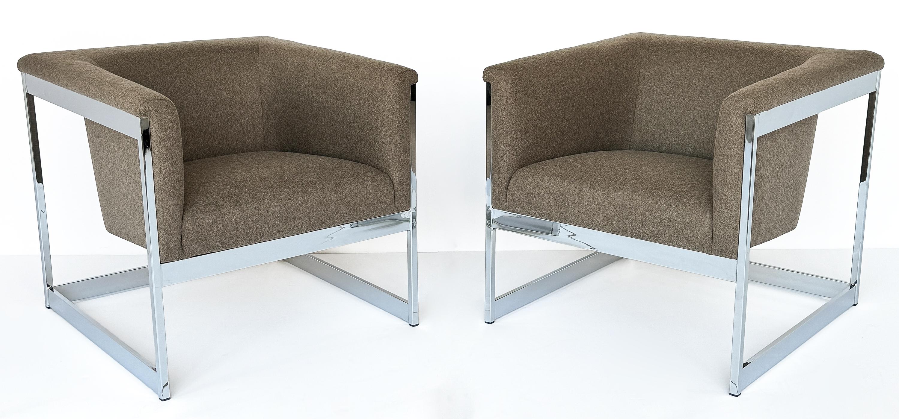 Introducing a pair of Milo Baughman chrome frame cube lounge chairs, circa 1970s. These sleek modern chairs have been newly upholstered in a mousy brown heathered felted wool blend fabric.  A fabric swatch is available upon request.  The tight