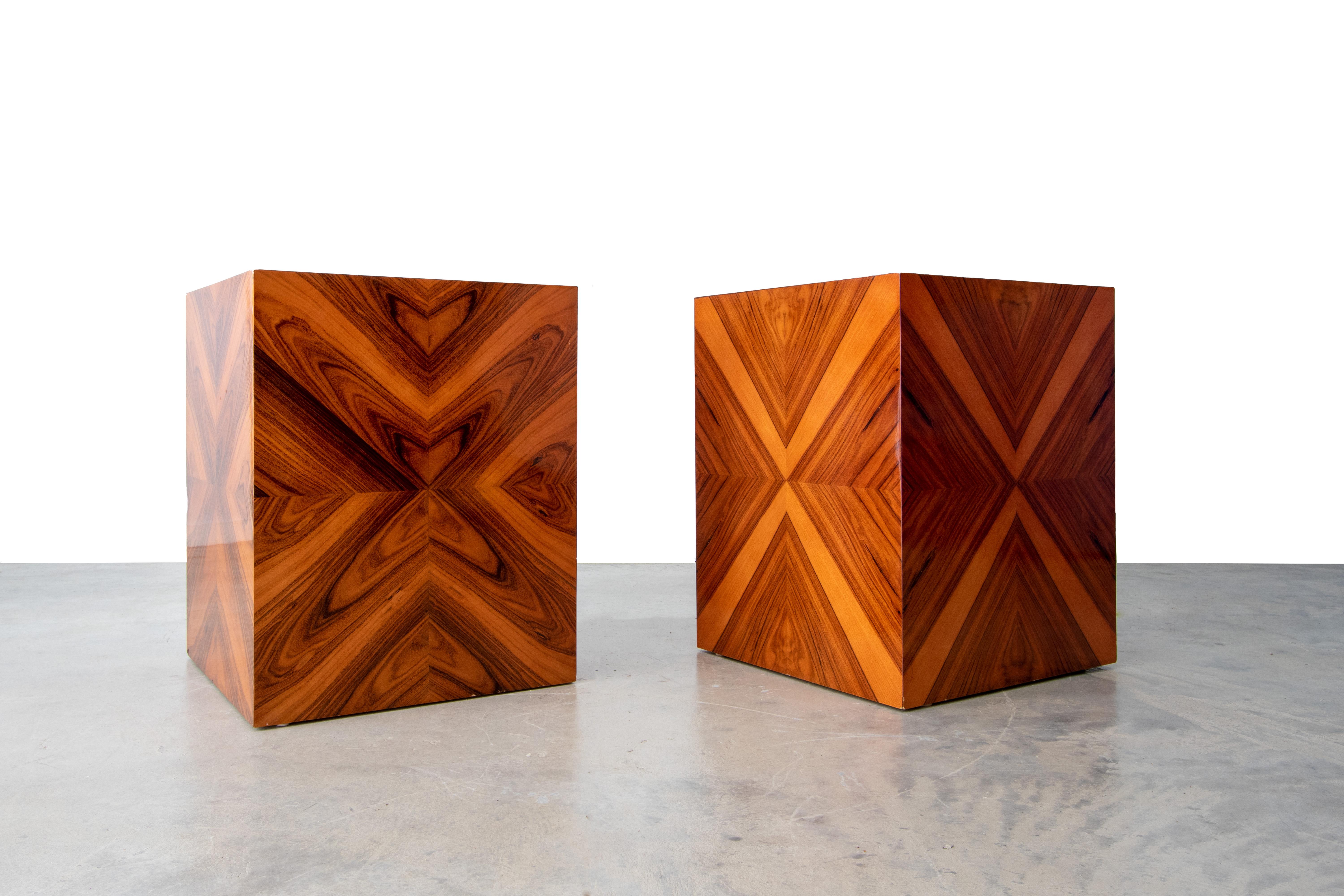 A pair of exotic rosewood veneer tables in a high gloss lacquer finish. Beautiful graining on every surface. One example retaining its original Thayer Coggin designed by Milo Baughman label.

Condition:

Wear and small chips to the bottom edges