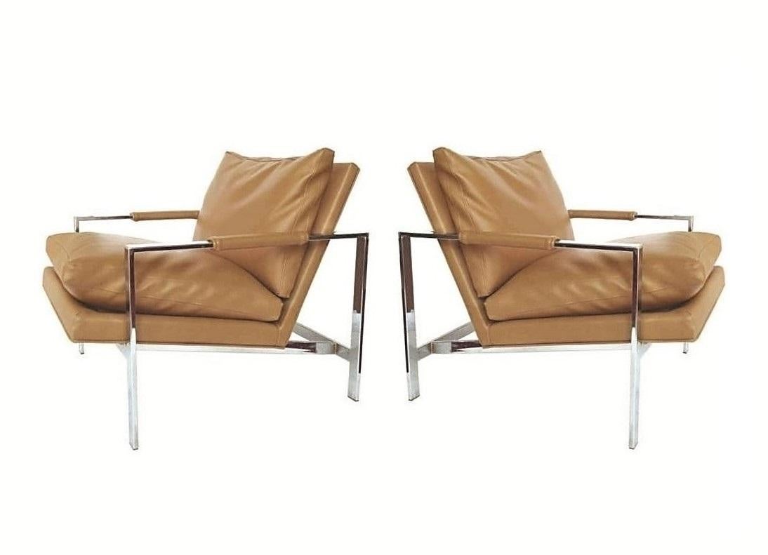 Originally designed in 1962 by Milo Baughman, the 951-103 model lounge chair is one of the most iconic mid-century modern chair designs. Thayer Coggin re-introduced this model in 2007. The camel colored leatherette beautifully complements the