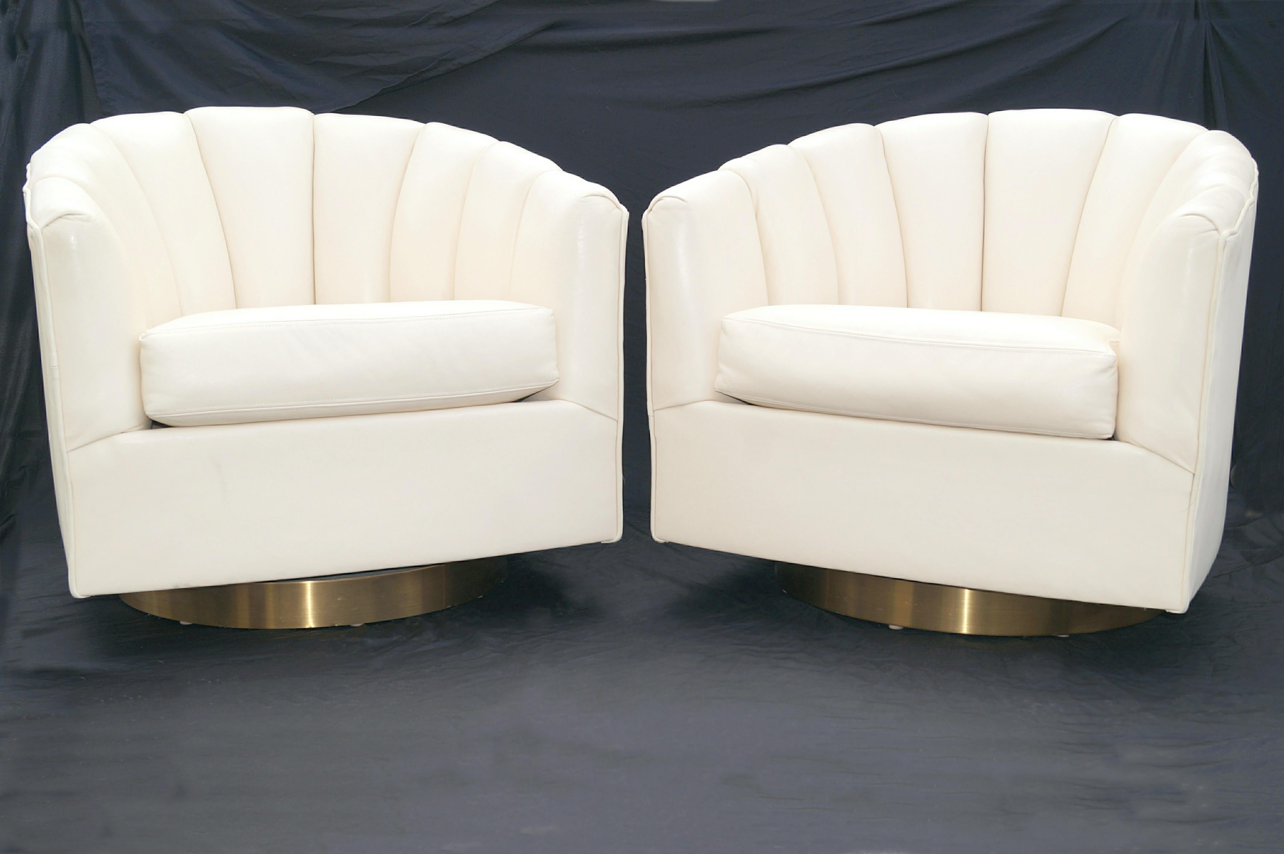 Pair Milo Baughman Style Brass Base Swivel Club Lounge Chairs . These do a swivel 180 turn. 2 Pairs currently available. Each set is for 2 chairs. The seat cushions appear to be leather, as the underside appears to have hide. See photo. The