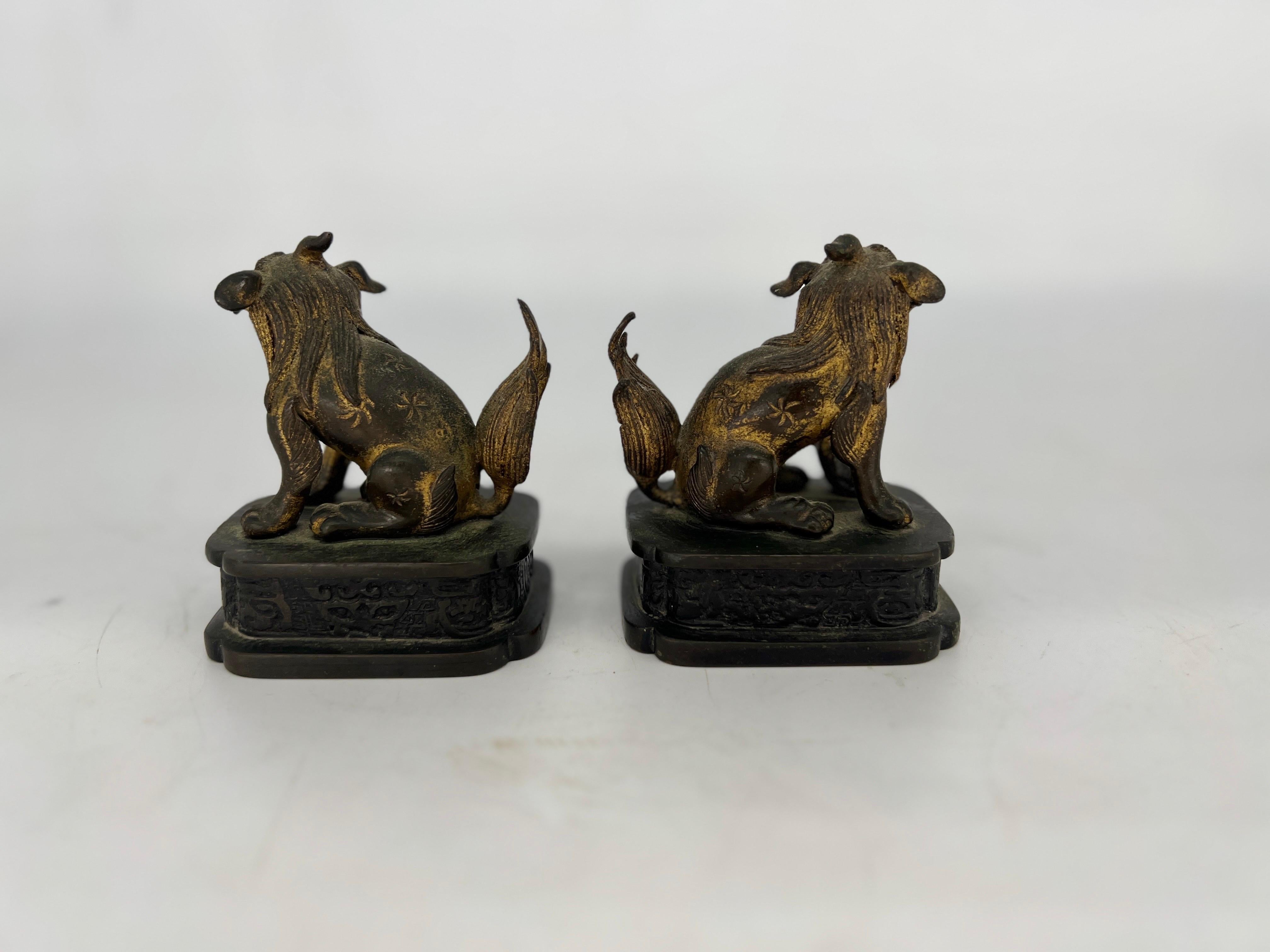Pair, Ming Dynasty Gilt Bronze Diminutive Chinese Foo Dogs / Guardian Lions In Good Condition For Sale In Atlanta, GA