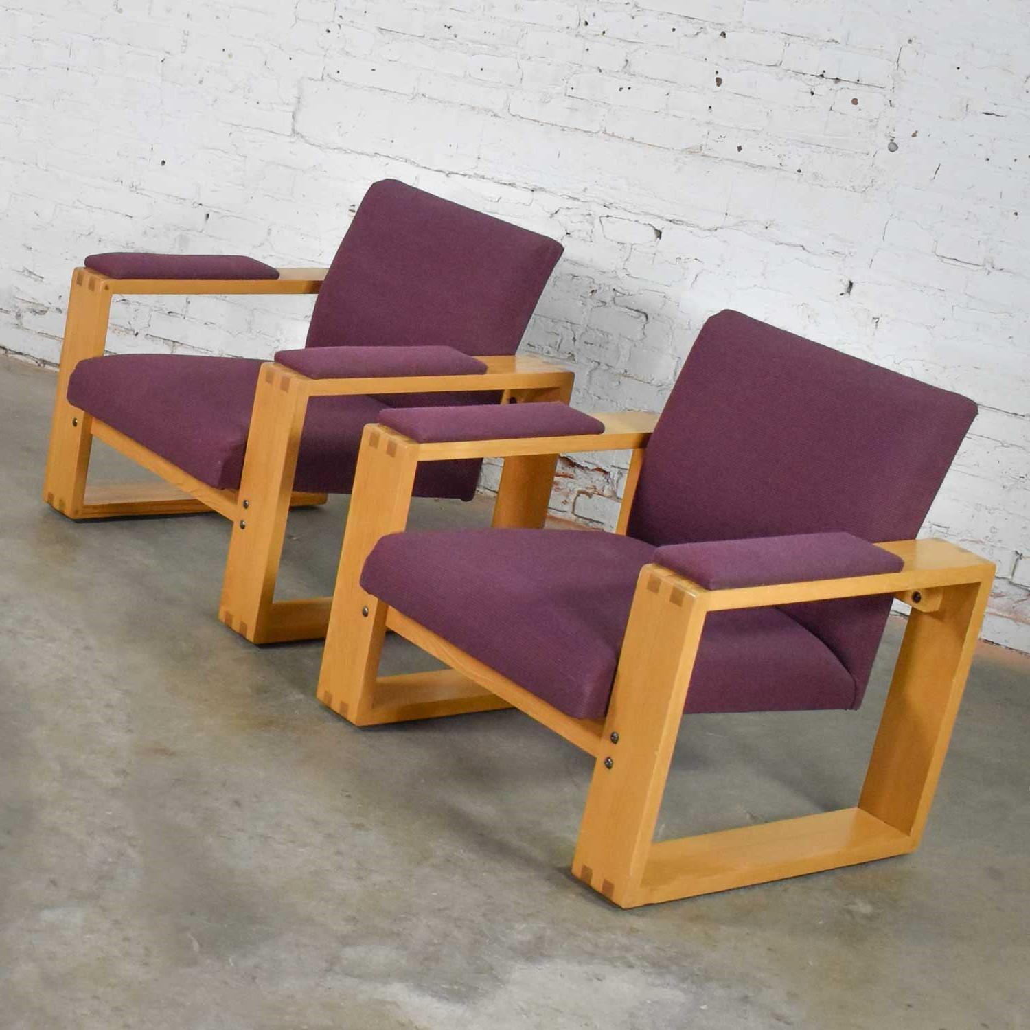 Handsome pair of modern oak open frame club chairs with a floating seat upholstered in a beautiful aubergine fabric. They are both in wonderful vintage condition. But they are vintage and in their original fabric so are not perfect. Please see