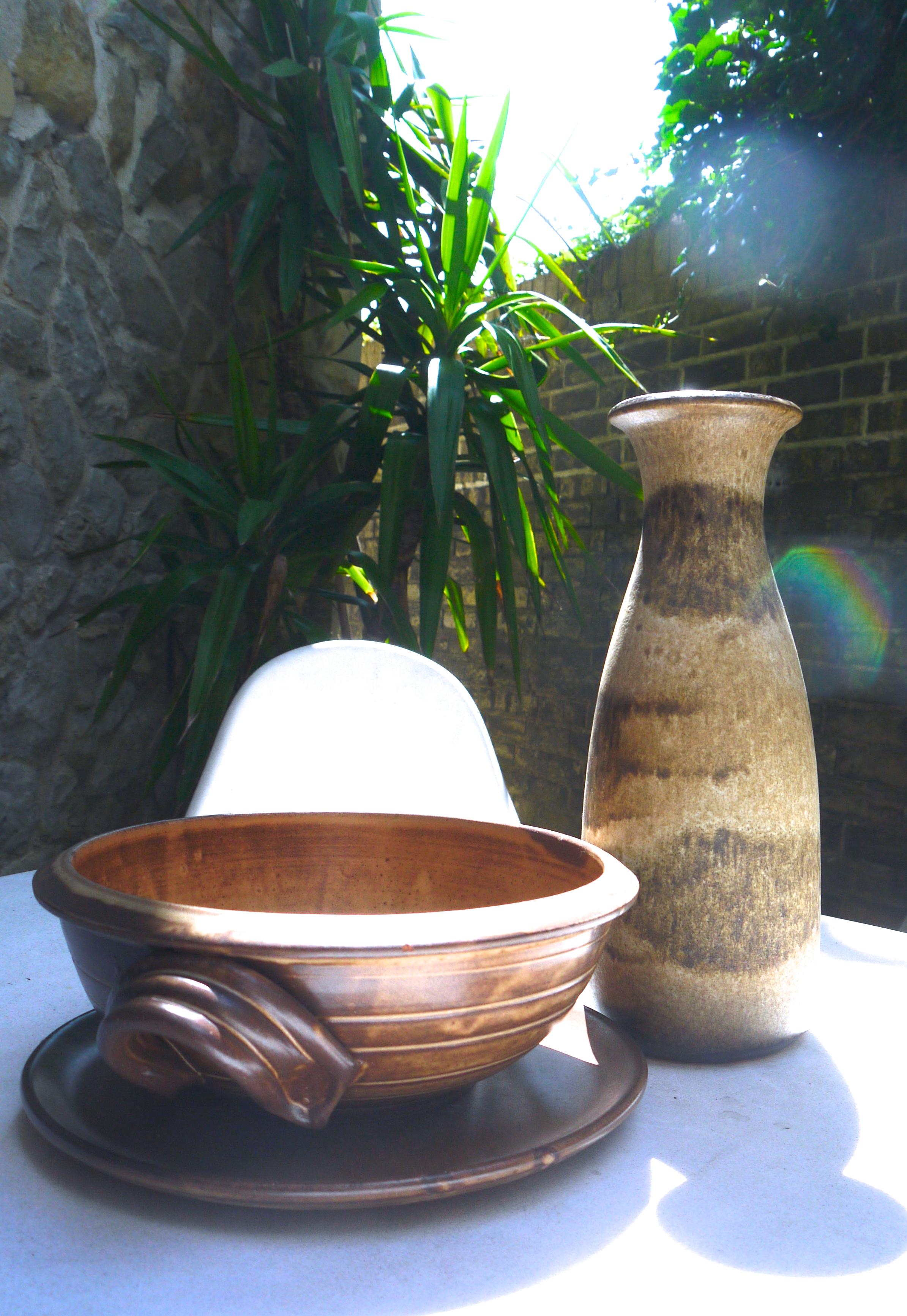 Pair of modernist rustic stoneware fruit bowl (Vallauris signed) and Scheurich 1965

Vallauris is a pottery region in south-eastern France, near Cannes. Pottery has been made there since ancient times. The area grew as a pottery centre in the late