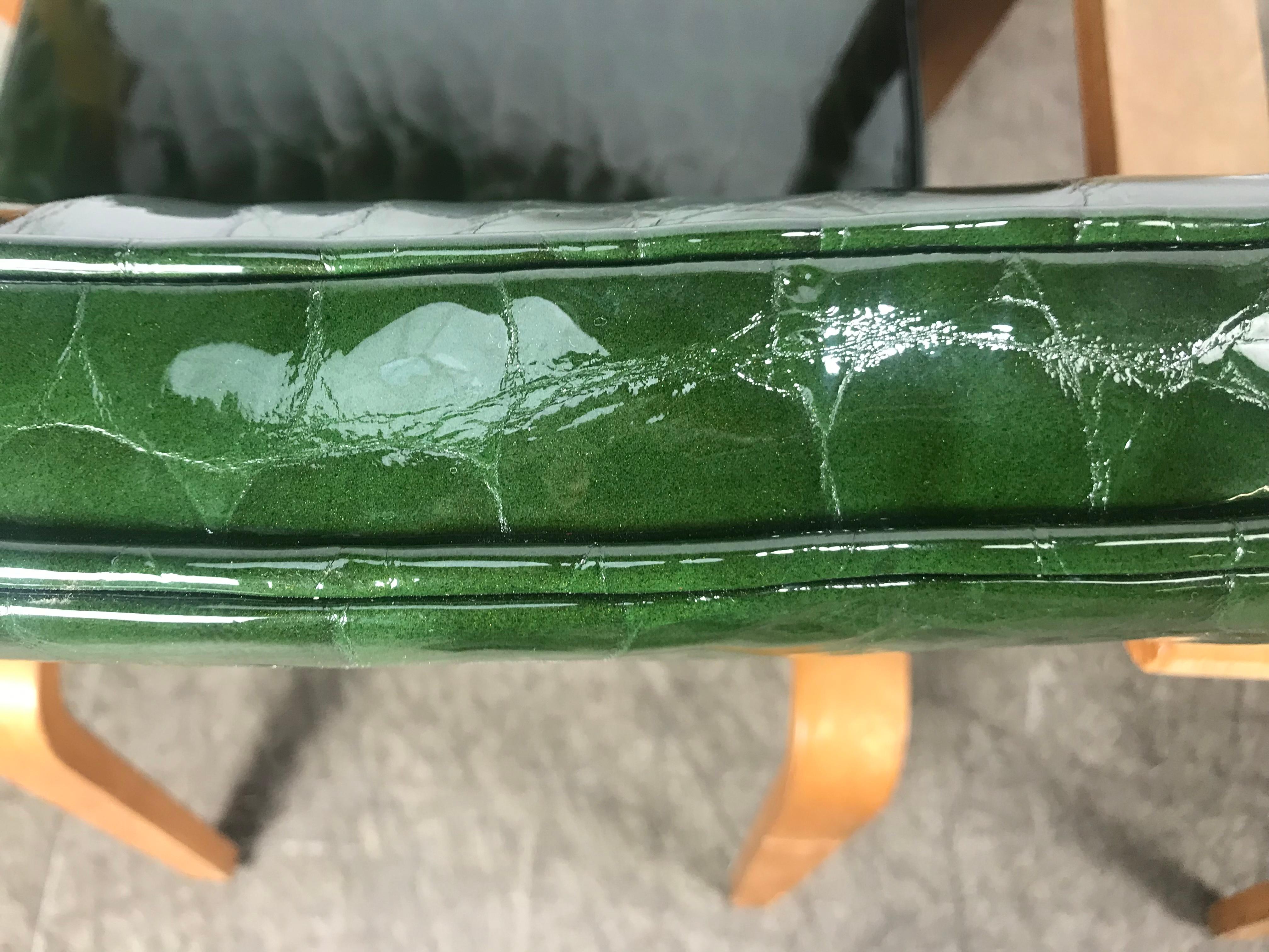 Pair of modernist Thonet bentwood and alligator emerald green patent leather lounge chairs, stunning color, amazing design, 1940s modern design, attributed to Gilbert Rohde, retain original Thonet New York label.