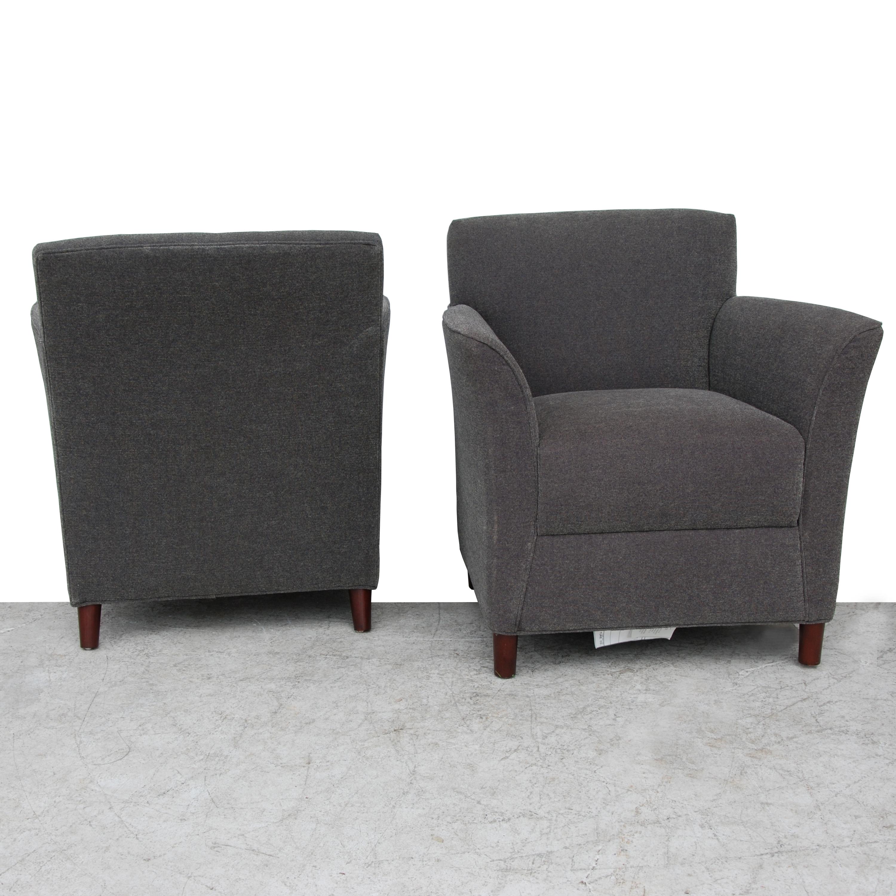 Pair of Moleskin lounge chairs by Bernhardt Furniture
 
Warm grey with gently sloping arms.

Measures: 31.25