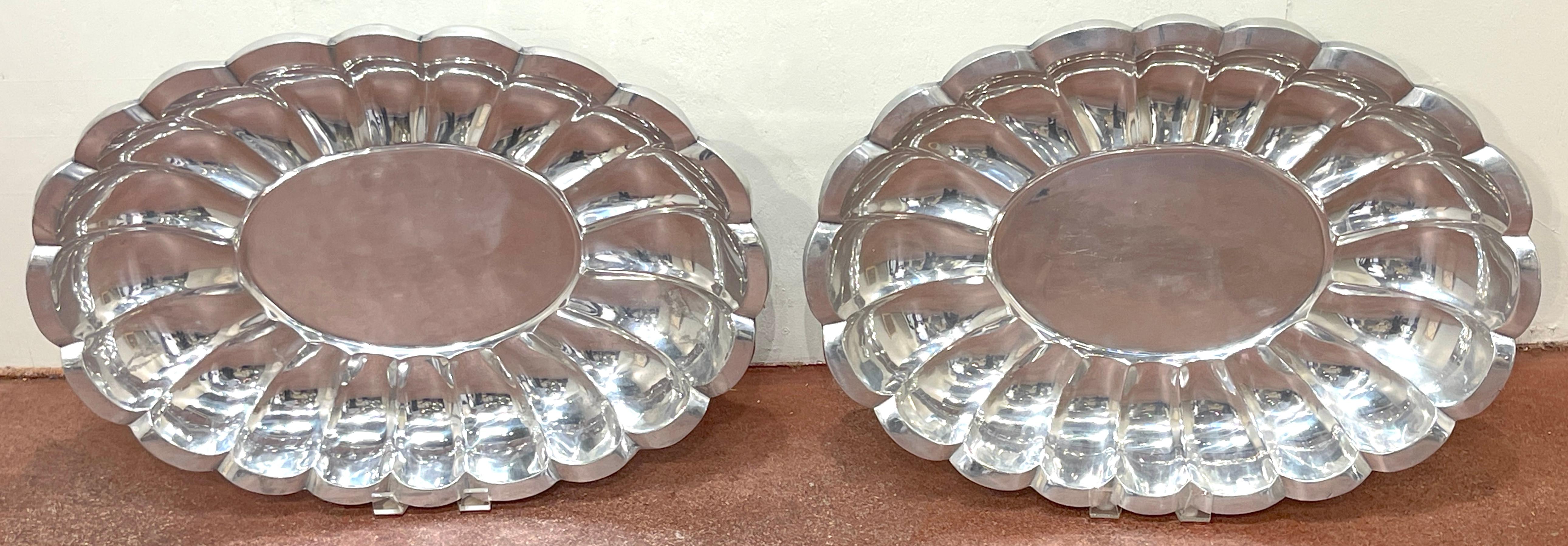 Pair Monumental Arthur Court Neoclassical/SSouthwest Style Oval Salvers/Trays
Later 20th century 

Elevate your interior with this captivating pair of monumental Arthur Court Neoclassical/Southwest Style Oval Salvers/Trays, embodying the epitome of