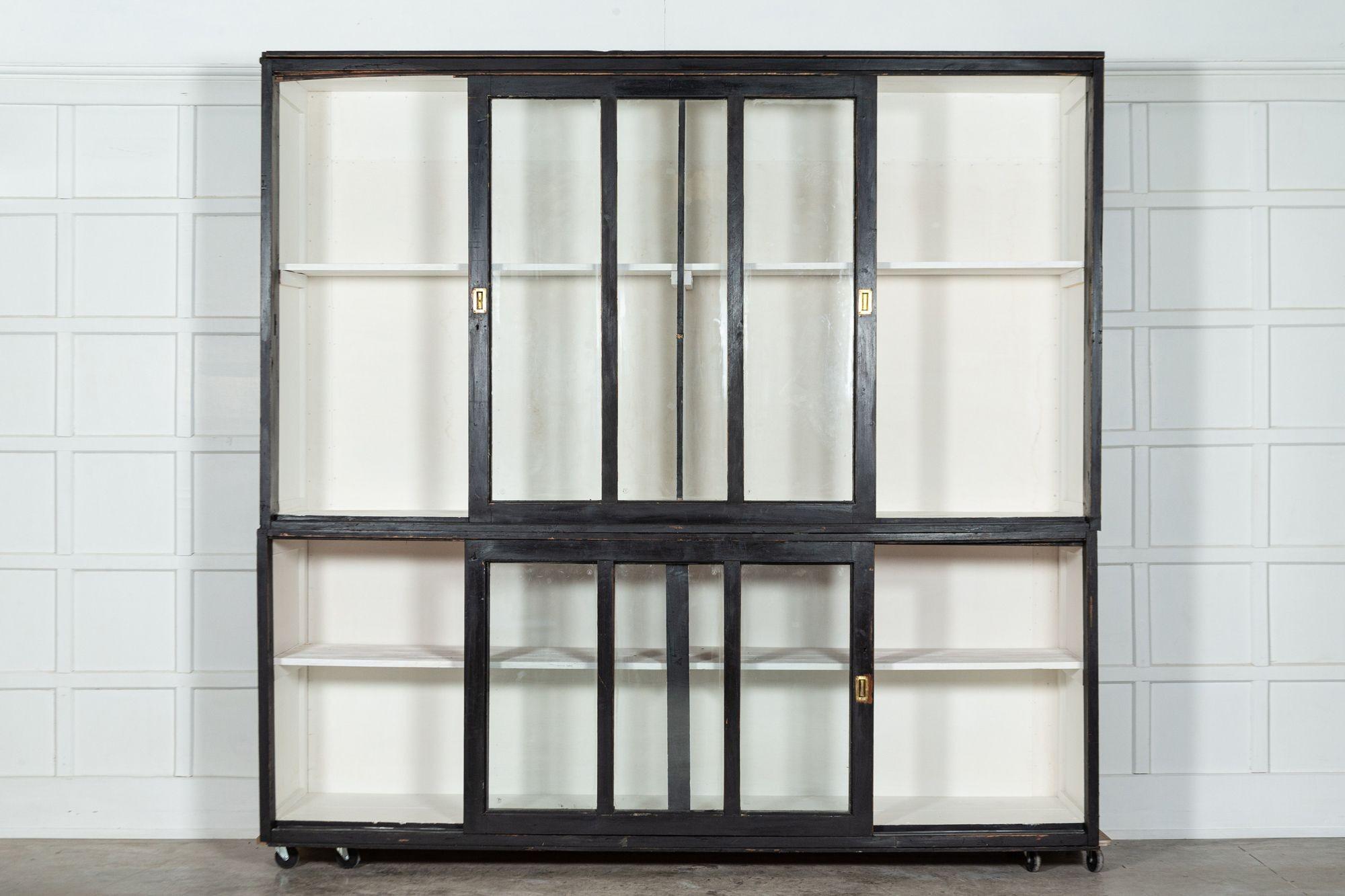 circa 1900
Monumental English Ebonised Glazed Housekeepers / Bookcase Cabinet
(All Glazing Safety Glass)
Price is each (x12 available)
(Extra shelves can be made)
sku 1530
Together W259 x D63 x H247cm
Base W259 x D63 x H100cm
Top W259 x D63 x H147