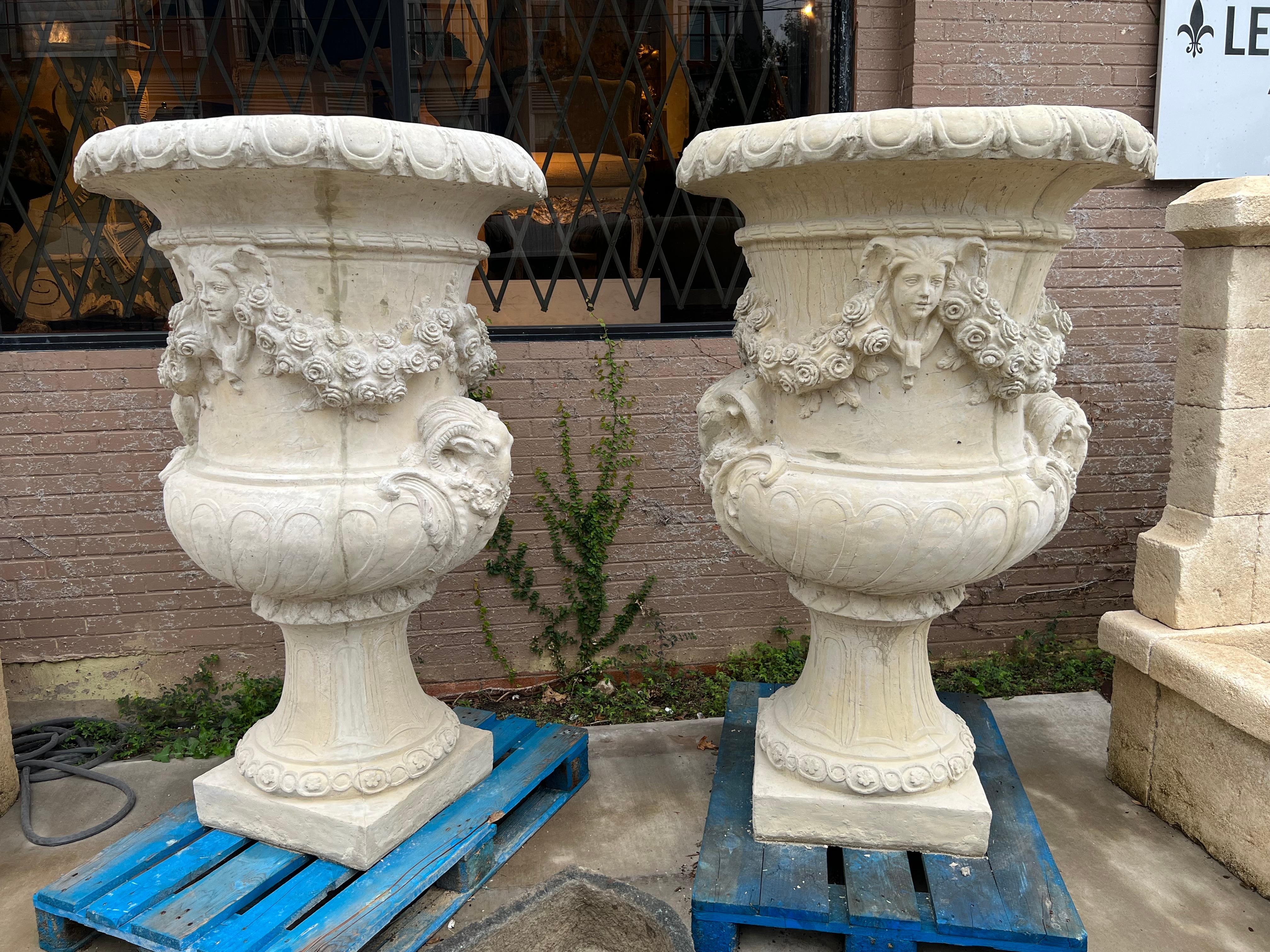 These huge urns, cast in France from crushed stones and cement measure an astounding 63 inches tall.  They are nearly the same dimension as the original “Vase du Printemps” from which they are based upon.  The vase was part of a set of four designed