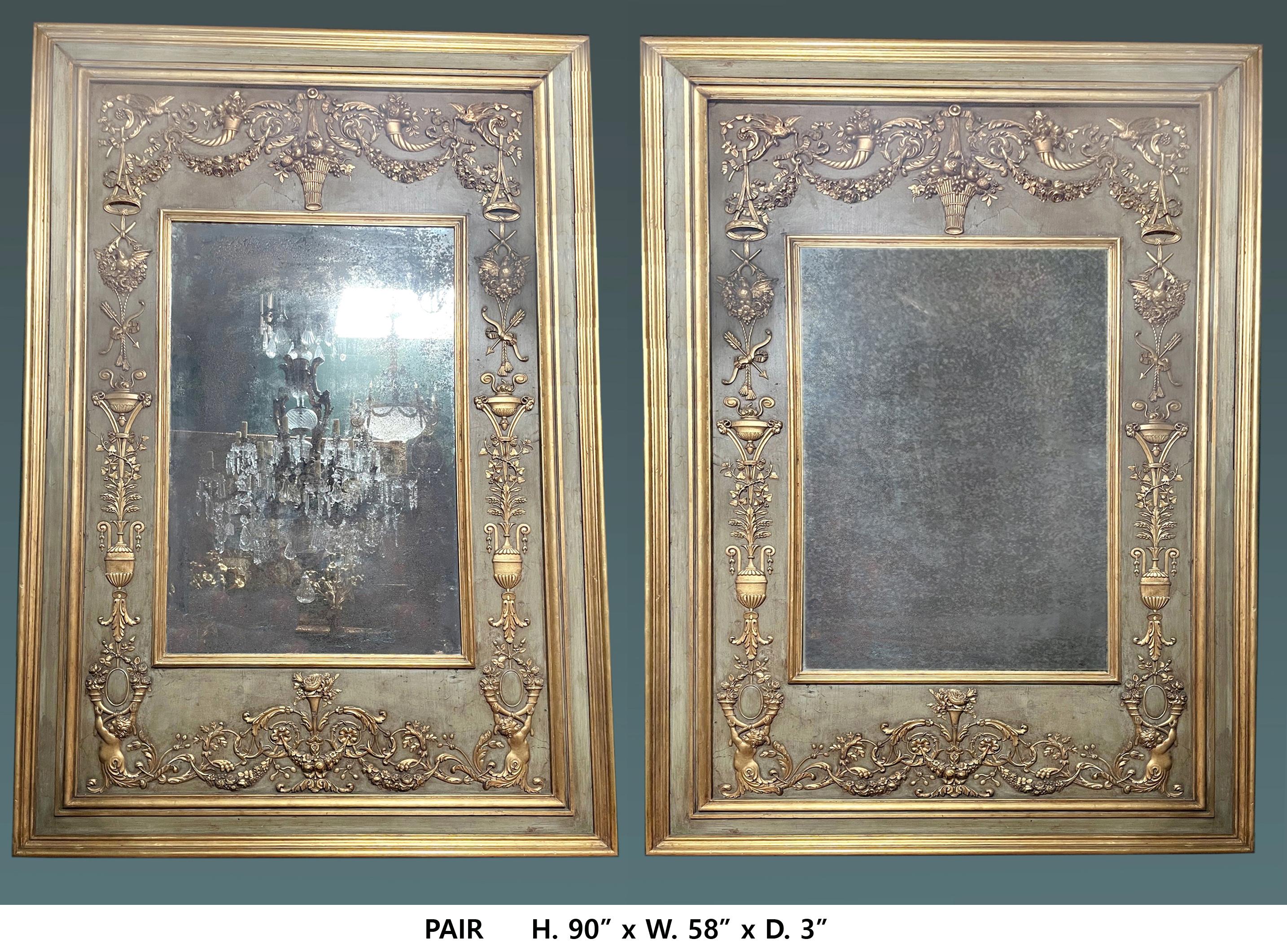 Exceptional monumental pair of 19 century Italian  partial gild and green painted decorated mirrors.
Meticulous attention has been given to every details..
With antique mirror plates.
Impressive statement in every home