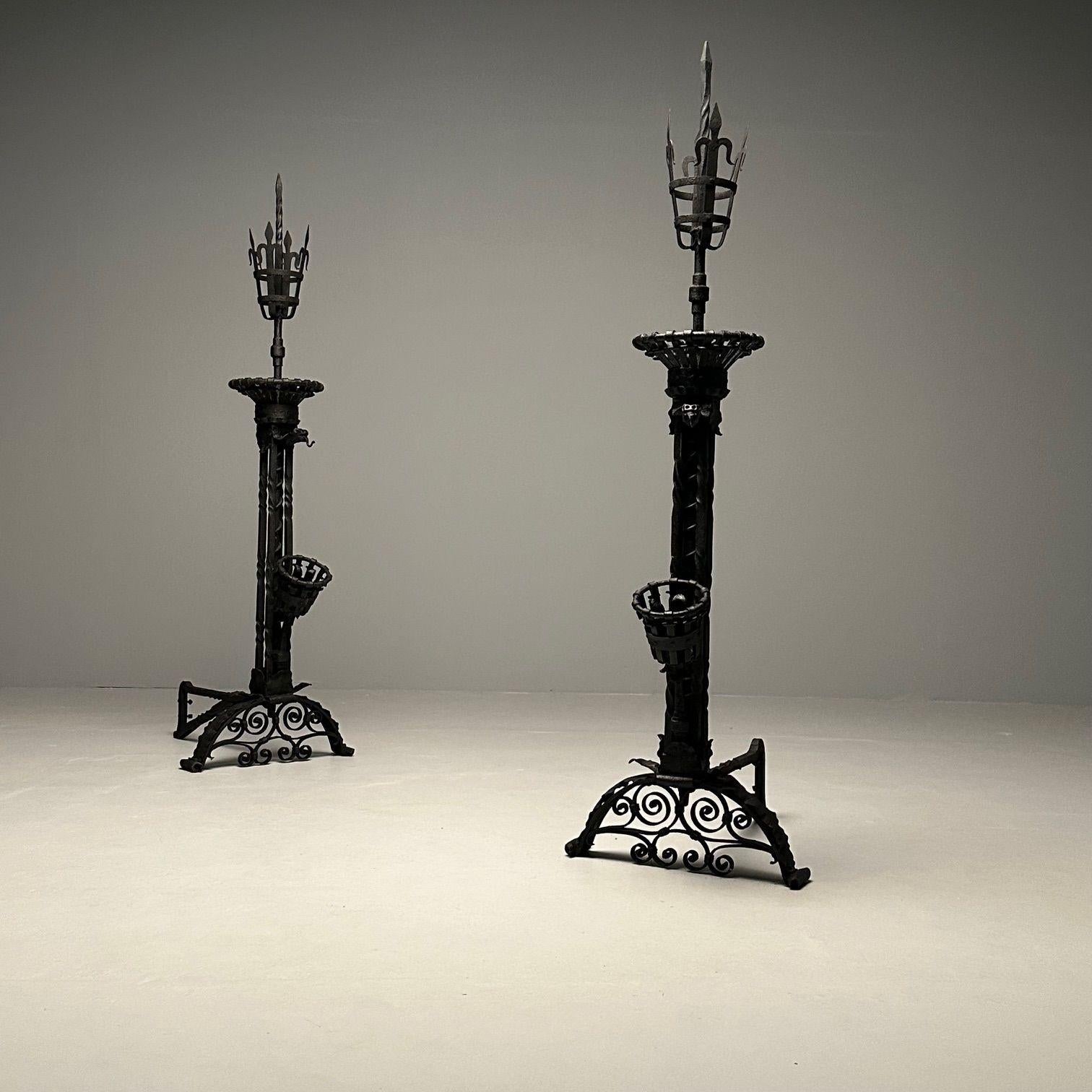 Pair Monumental Samuel Yellin Style Wrought Iron Andirons, Italian Renaissance, Late 19th early 20th century

Palatial in Size are these finely cast pair of Arts and Crafts Gothic andirons attributed to Samuel Yellin with orb finials scrolled weaved