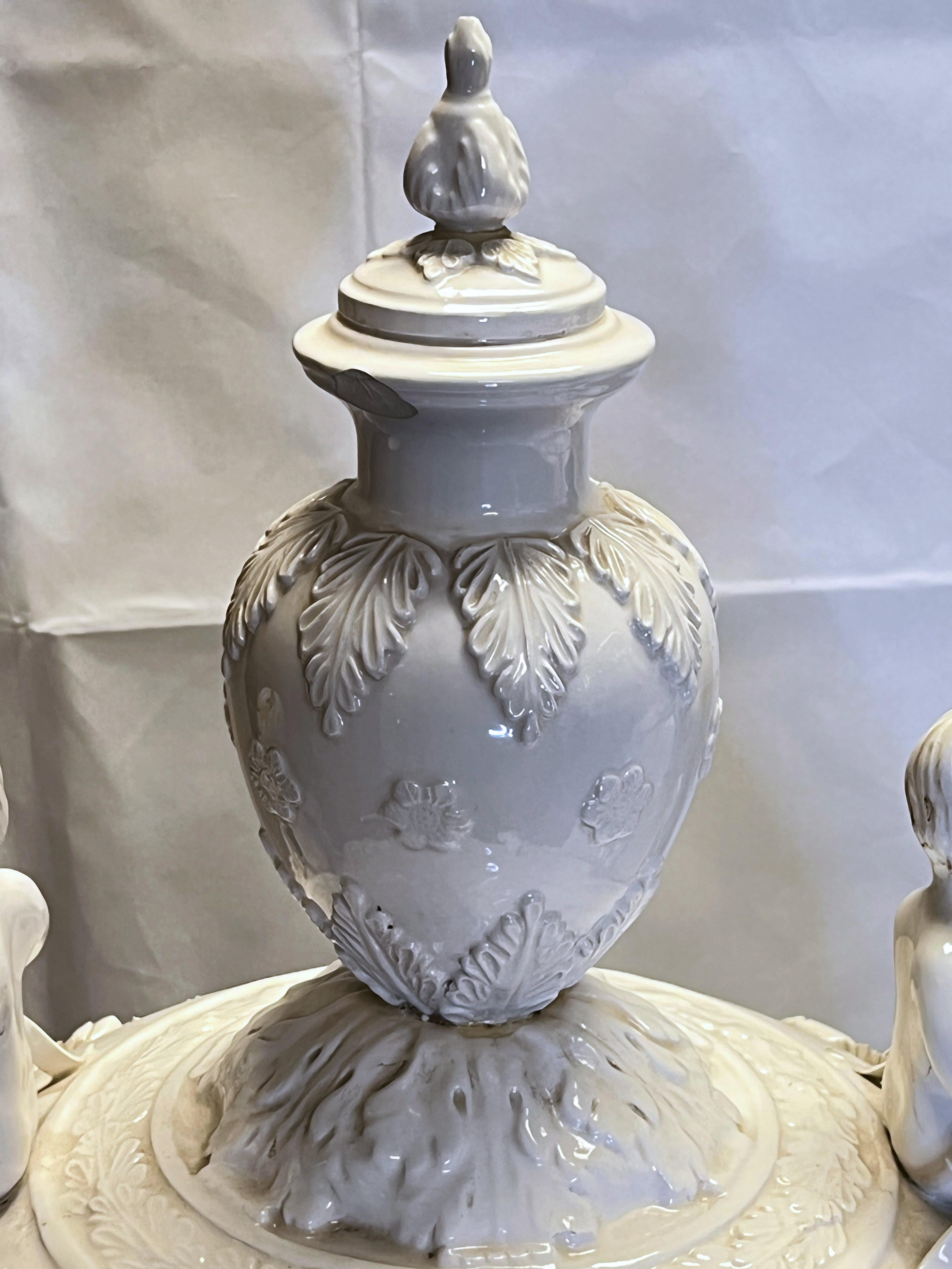 Pair monumental white glazed Northern European floor vases and covers.