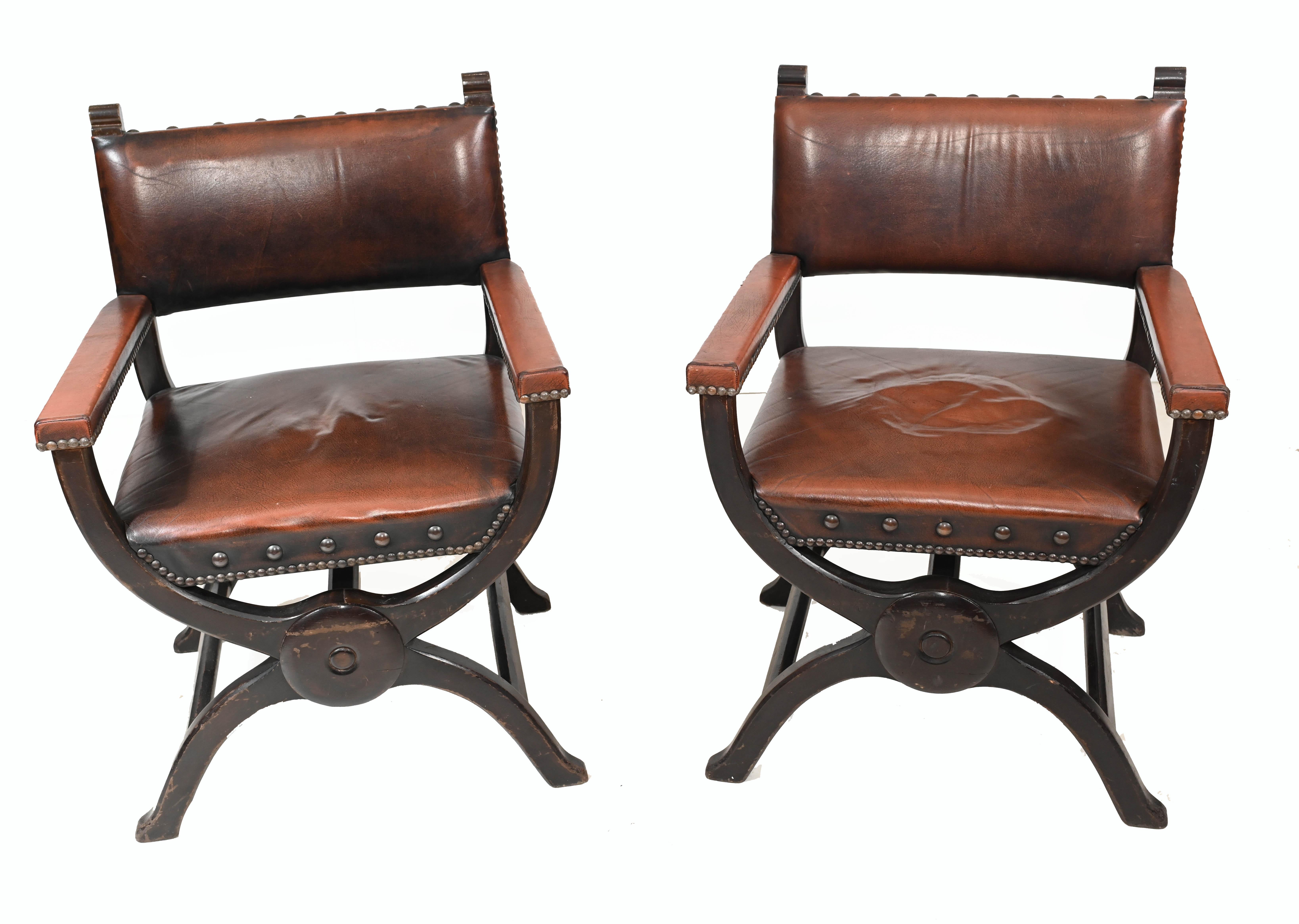 Pair antique Moroccan arm chairs with x frame design
Cool interiors pair with leather upholstery and cushioned arms
We date these leather chairs to circa 1920
Offered in great shape ready for home use right away
We ship to every corner of the