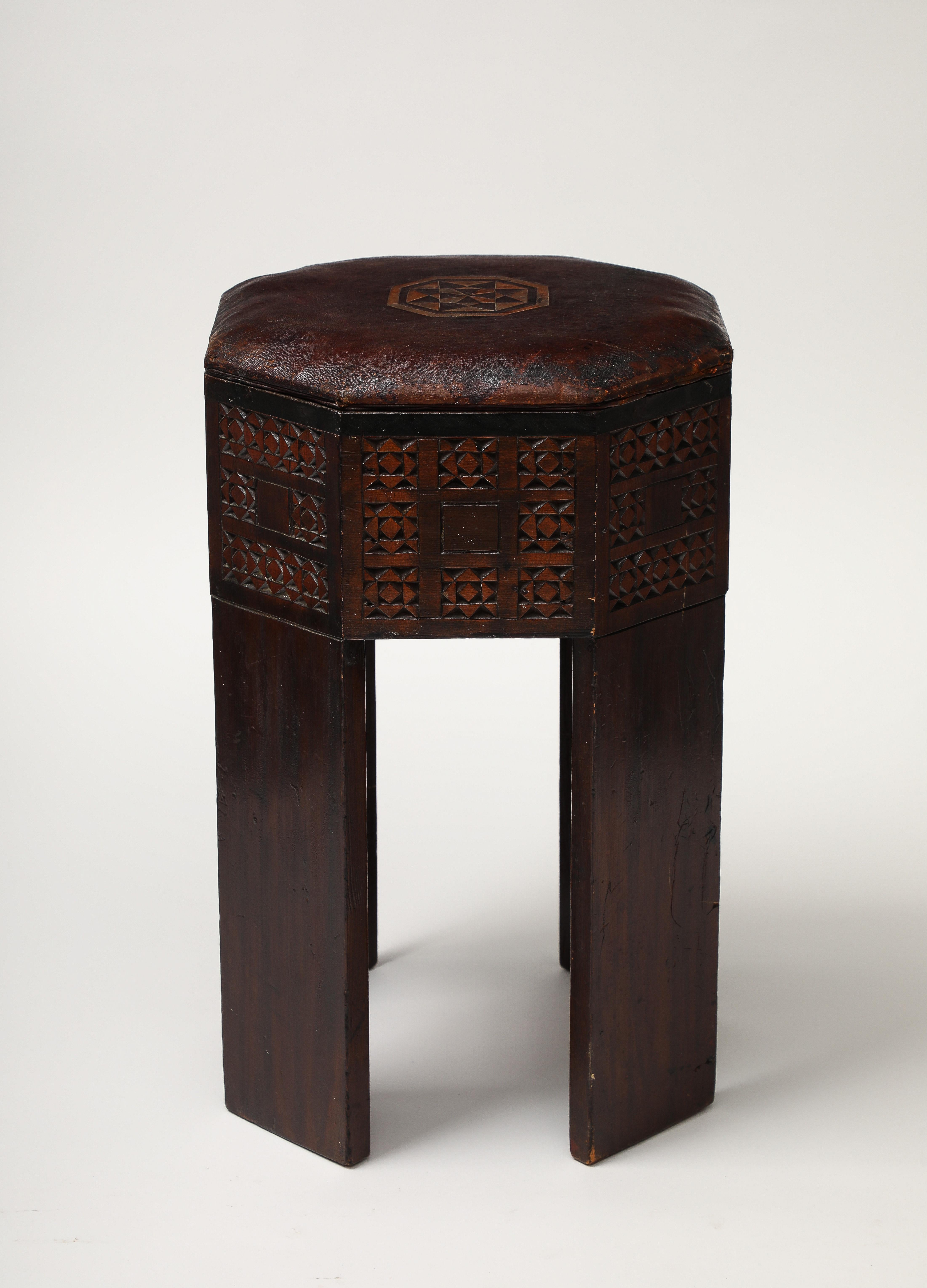 Beautiful pair of Moroccan stools The top is in leather with moorish design