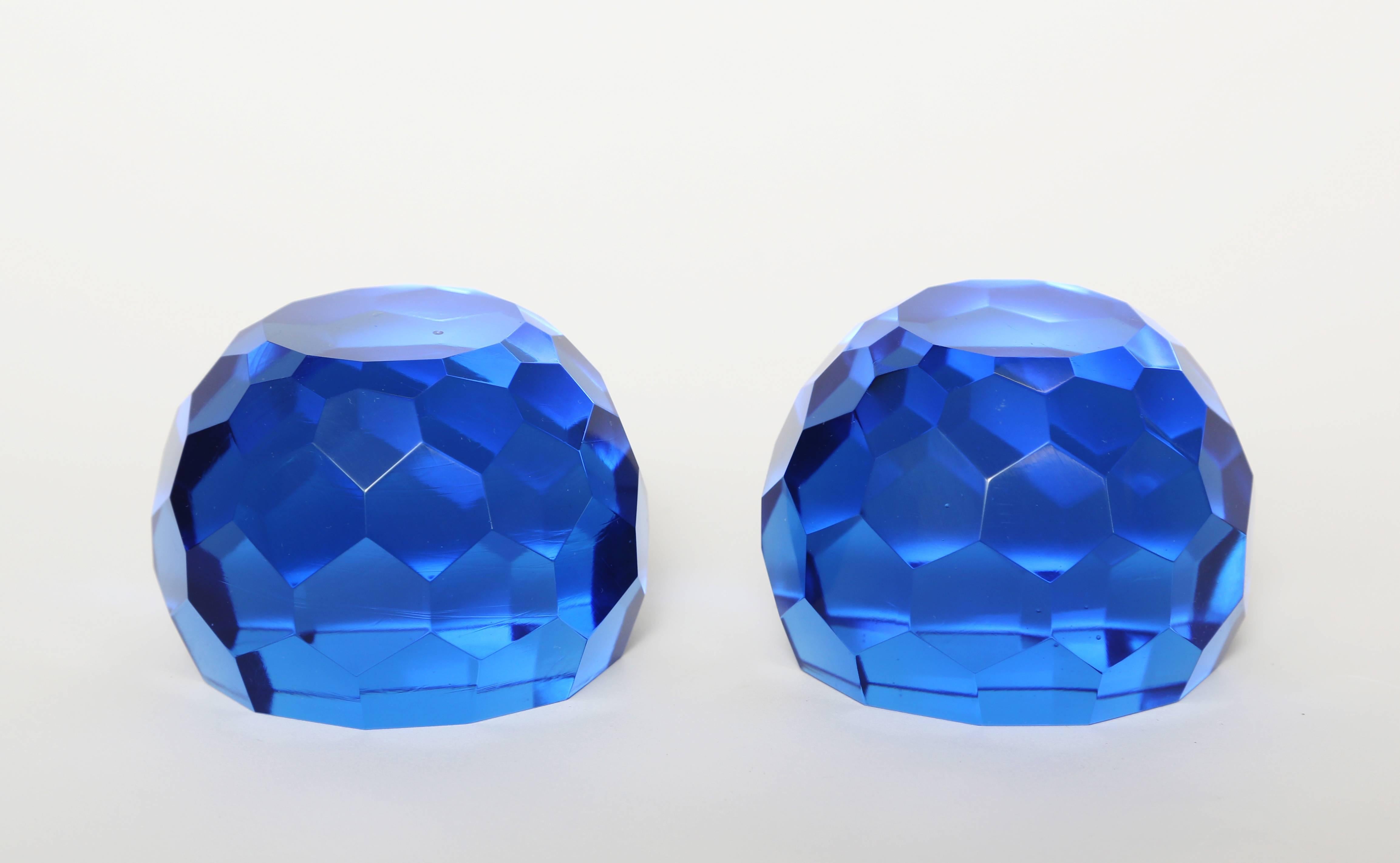 Unusual to find a pair of matched paperweights, probably made for a partner's desk. This pair of blown, handcut and multifaceted cobalt blue paperweights remain in excellent condition.

(This item is eligible for a complimentary gift box upon