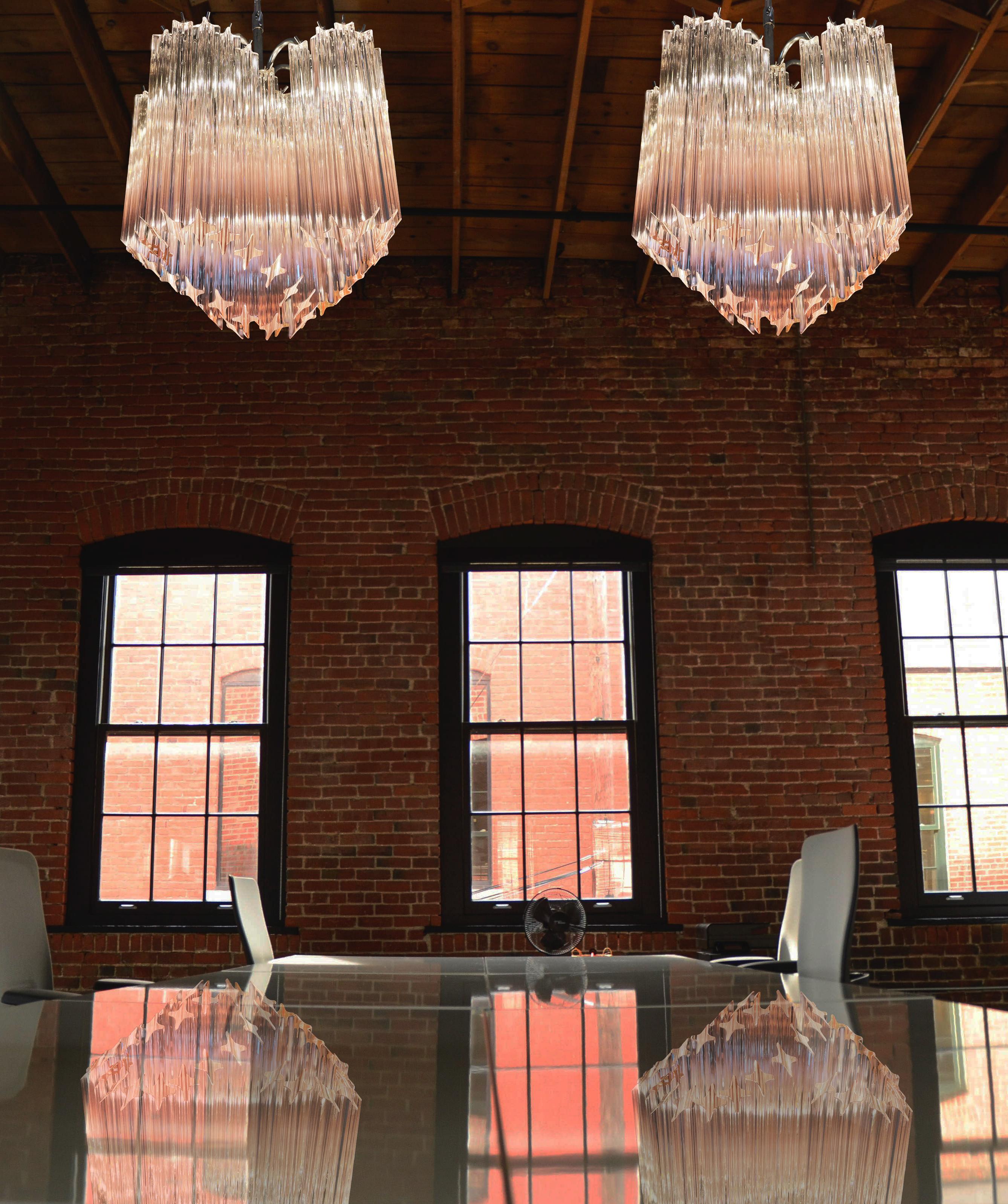 
Pair Murano glass chandelier, spiral shape, very elegant, 60 pink quadriedri on nickel metal frame. This Mid- Century Italian chandelier is truly a timeless classic.
Period:late xx century
Dimensions: 46.50 inches (120 cm) height with chain; 21.70
