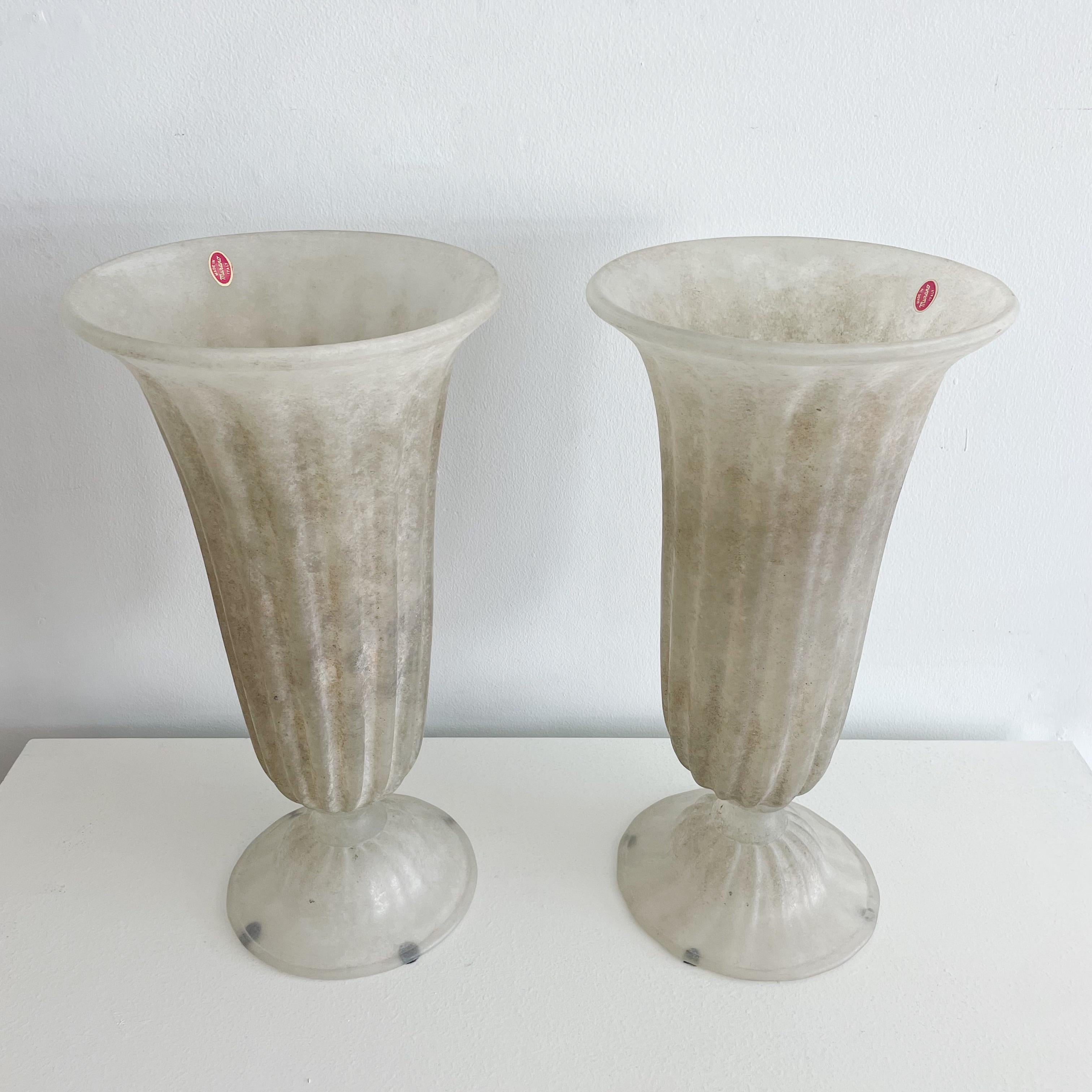 Tall pair of scavo taupe colored Murano ribbed vases. Unsigned with original Murano foil label. The width of the vase measures 10' and the width of the base measures 8