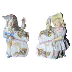 Paire de vases à figures de musiciens en porcelaine par Heubach Brothers, début du 20e siècle