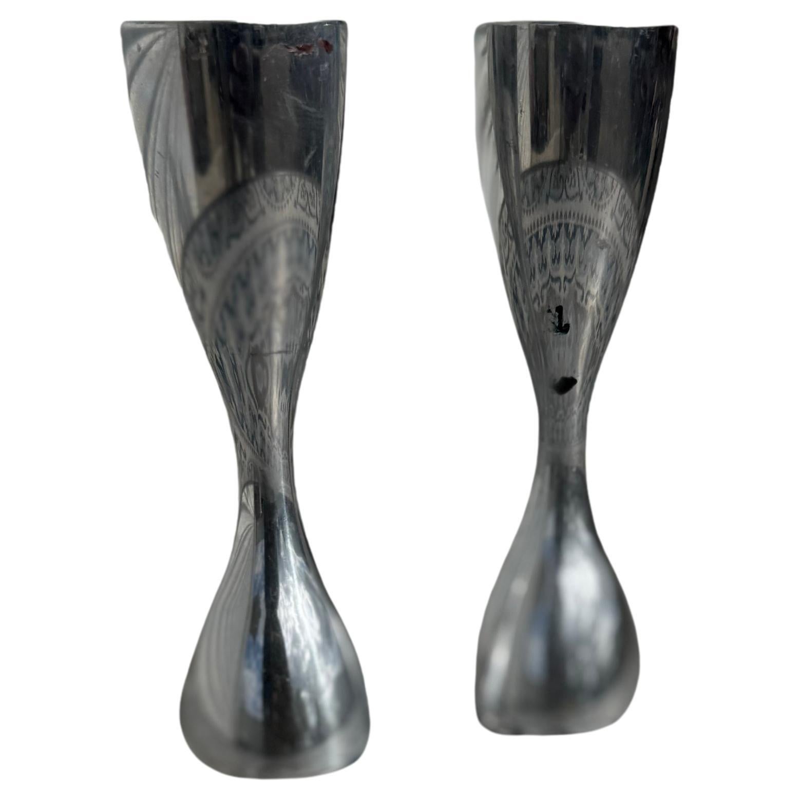 Coppia di portacandele in alluminio lucido Nambe