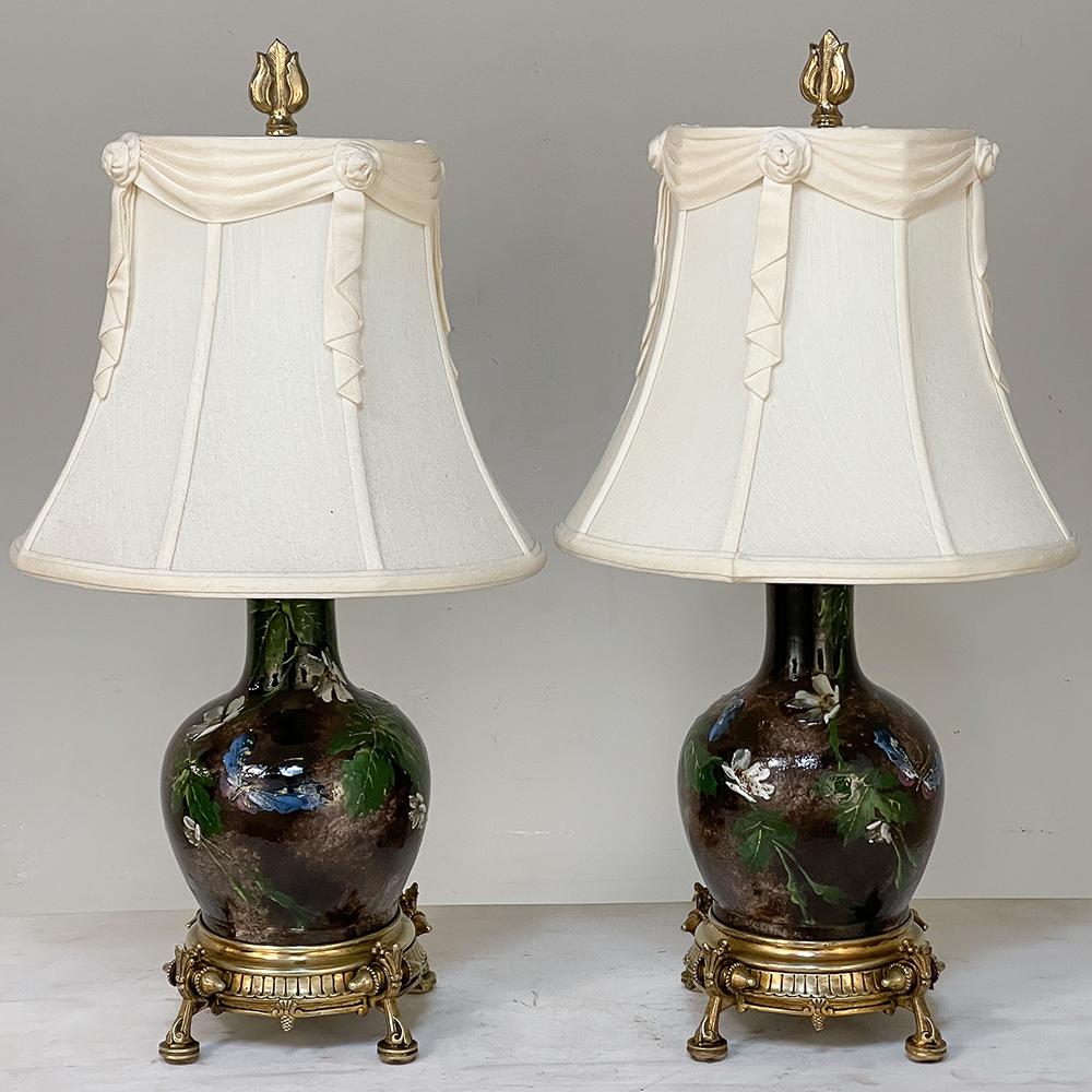 Pair Napoleon III Period Glazed Faience table lamps with Bronze Bases will make a timeless style addition to any room, enhanced by the craftsmanship and quality of a bygone era! Two earthenware urns were hand-painted so they're a pair, but each is