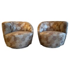 Pair Nautilus Swivel Club Chairs attributed to Directional