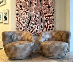 Pair Nautilus Swivel Club Chairs attributed to Directional