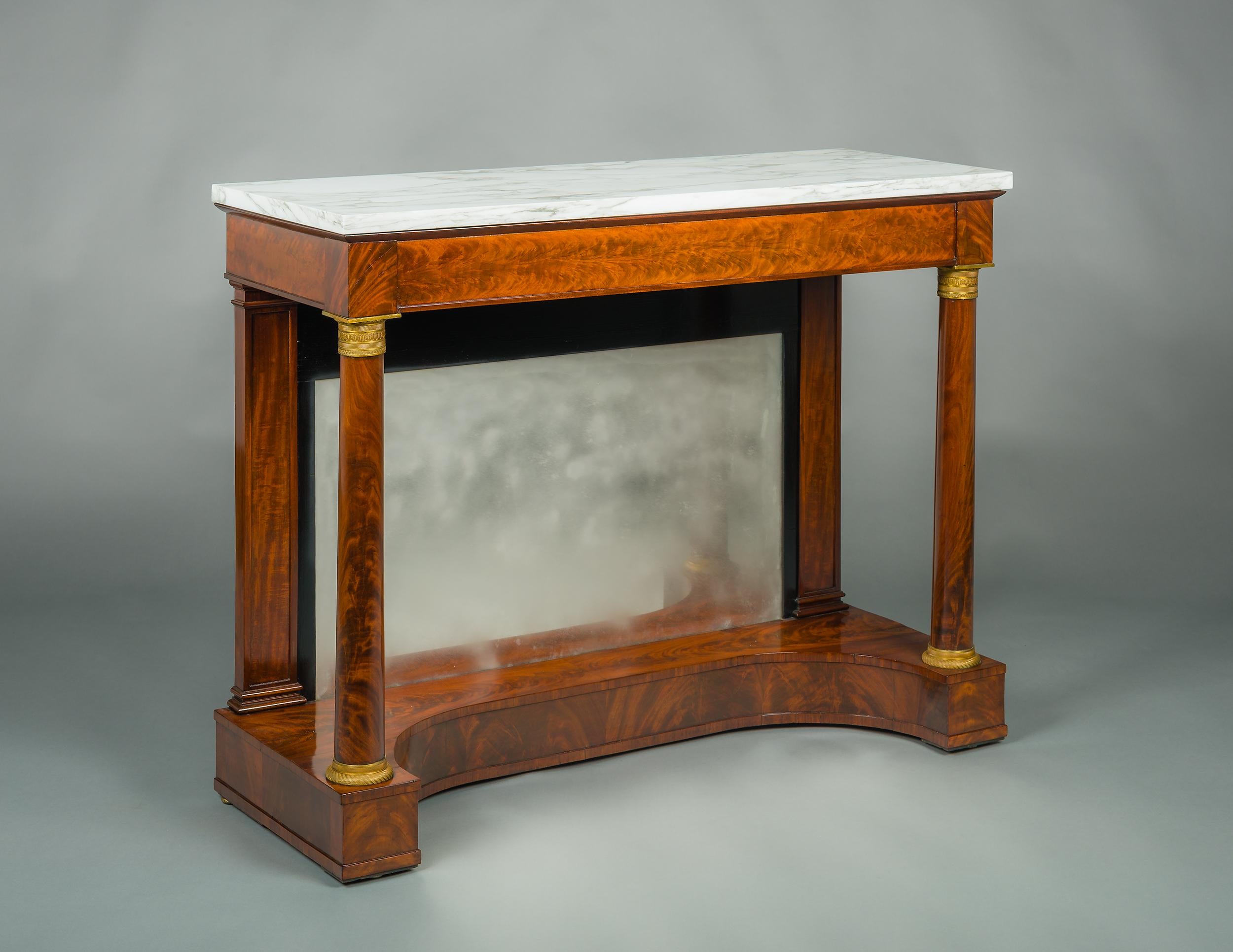 Pair Neo-Classical Pier tables, about 1825
Boston
Each, mahogany (secondary woods: chestnut and pine), partially ebonized, with ormolu mounts and marble tops
Each, 37 1/8 in. high x 47 7/8 in. wide x 17 3/4 in. deep

EX COLL.: Henrietta Atwater