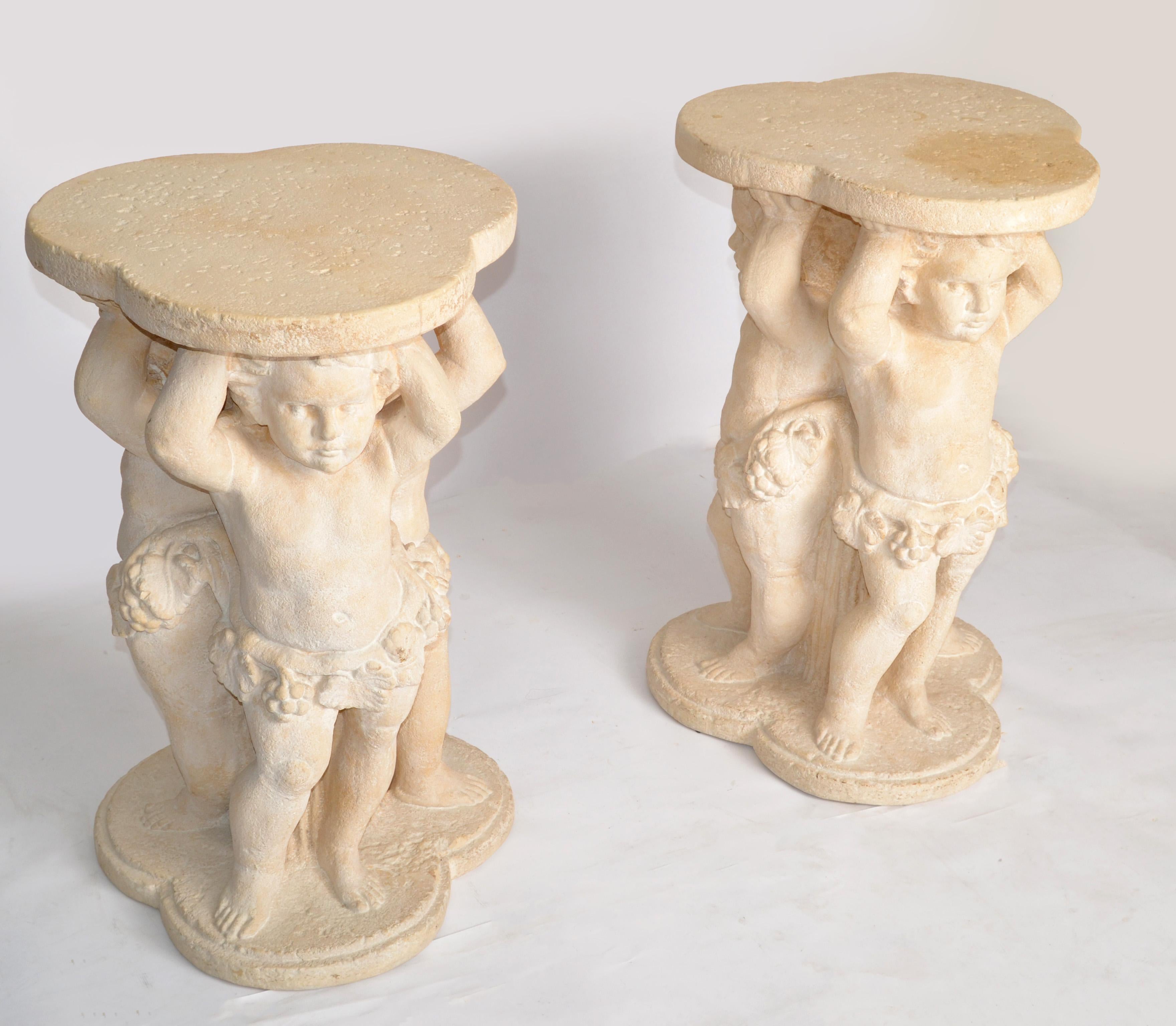 Charming early 20th Century Pair of Hand-carved Stone Table Bases, Pedestal's, Columns, Stands from Italy made in circa 1940. 
Depicting 3 Angel Figurines holding a leaf shaped Top. All made out of one piece of Stone with attention to detail.