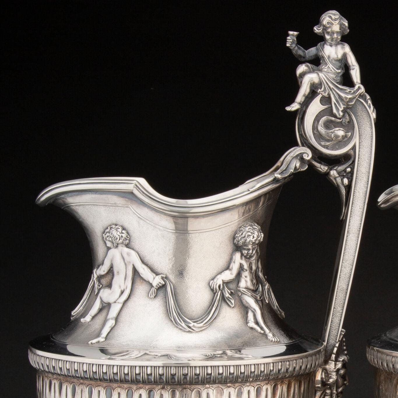 Repoussé Pair Neoclassical Silver Water Pitchers by Gorham