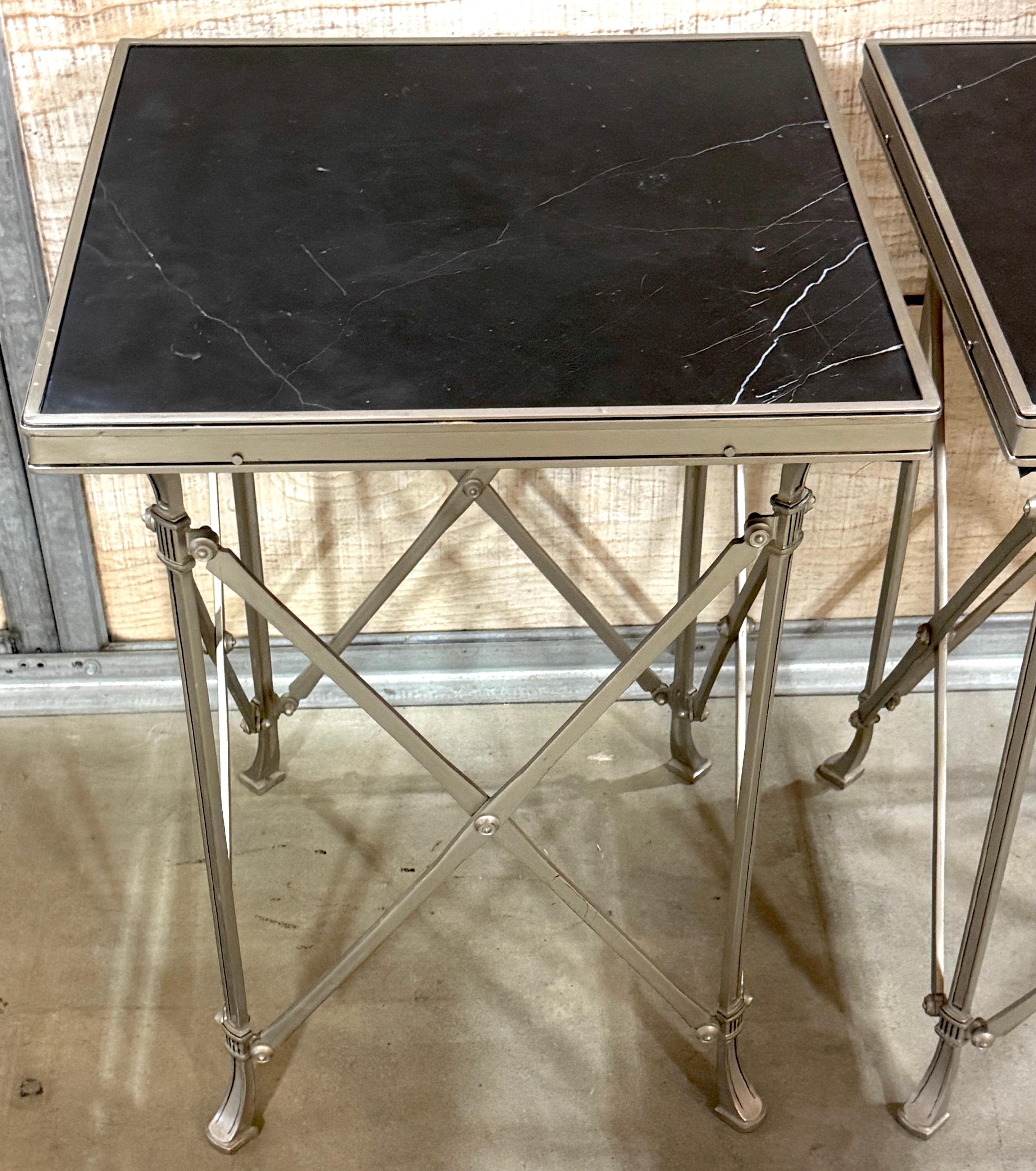 Pair of Neoclassical Silvered Bronze & Black Marble Gueridon Side Tables, in the Style of Maison Jansen

France, Late 20th Century
Each: 18ʺ W × 18ʺ D × 27.5ʺ H

Elegant and architectonic, this sophisticated pair of French gueridons features crisply