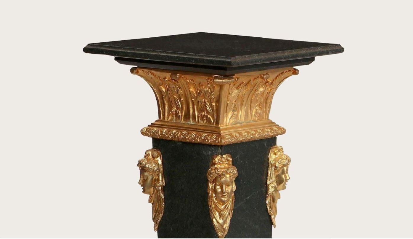 Marble Pair Neoclassical style black marble pedestals, with bronze mount  For Sale