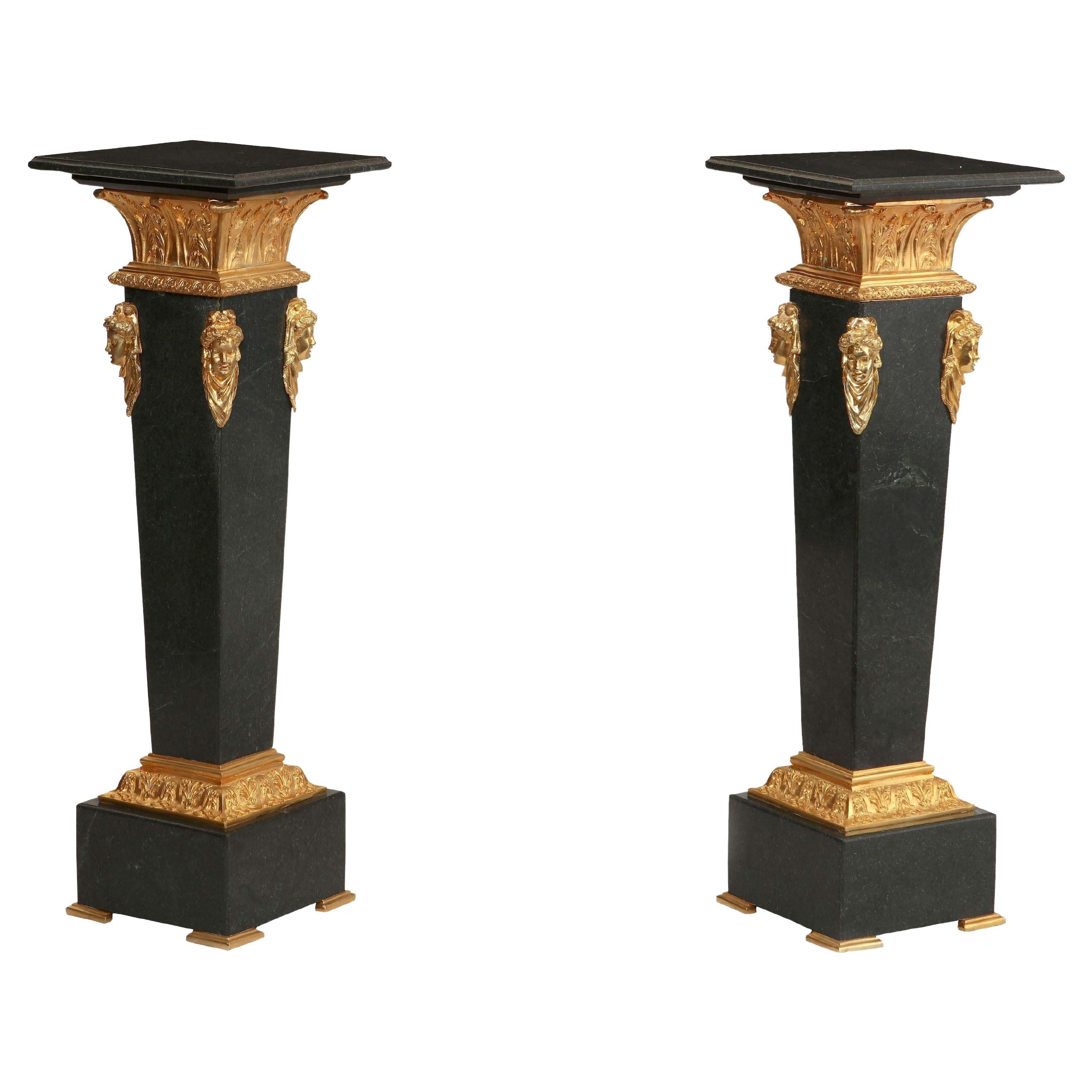 Pair Neoclassical style black marble pedestals, with bronze mount  For Sale
