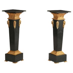 Vintage Pair Neoclassical style black marble pedestals, with bronze mount 