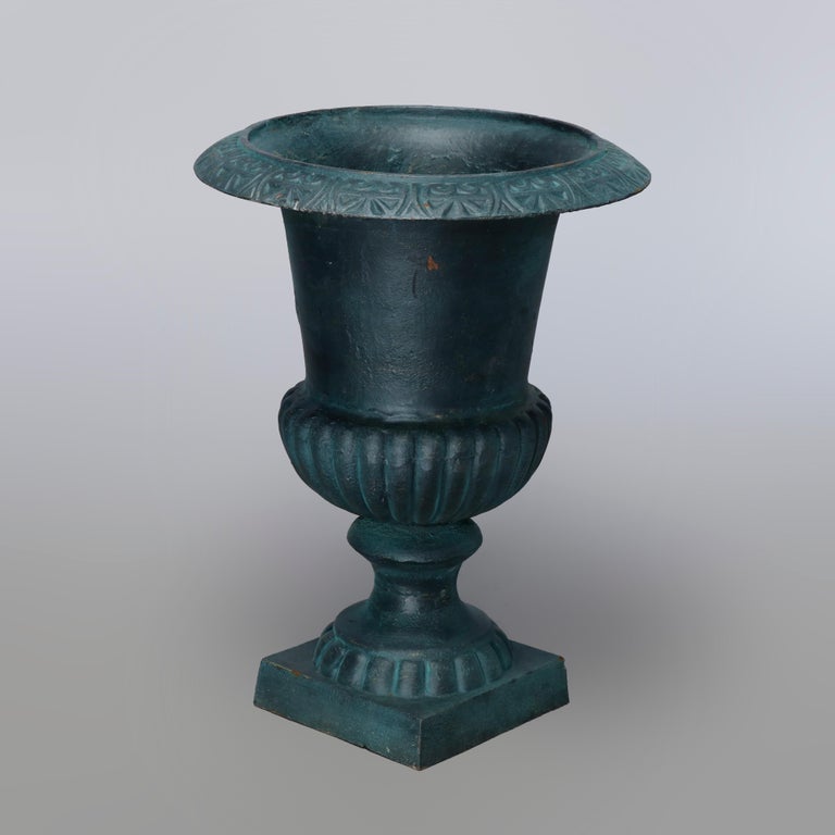 20th Century Pair of Neoclassical Style Melon Ribbed Cast Iron Garden Urns, 20th C For Sale