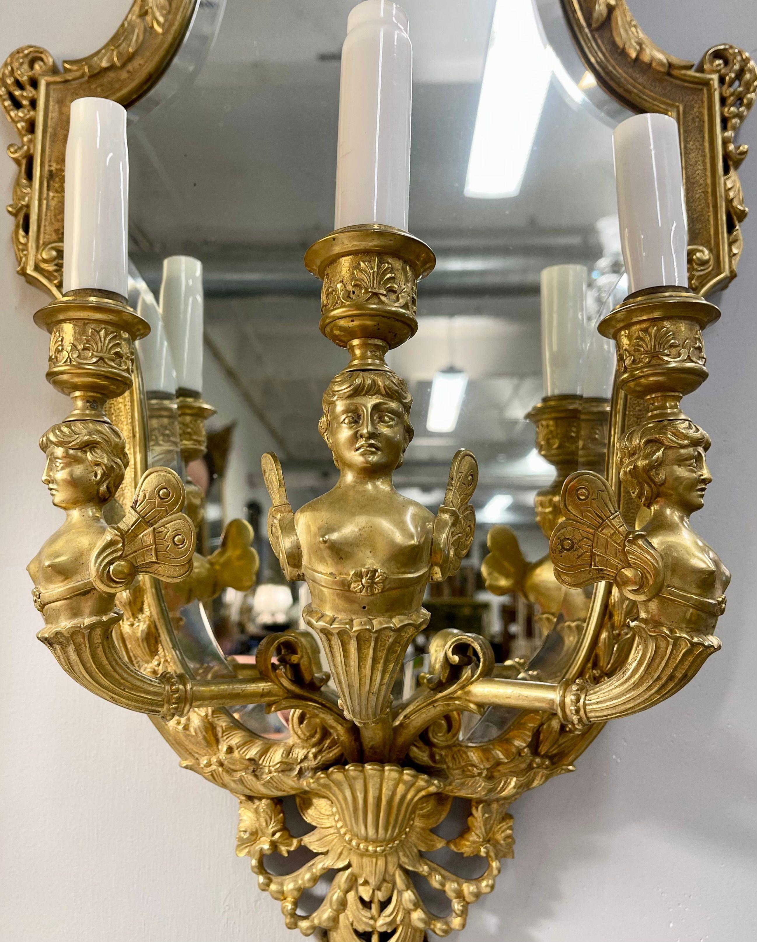 20th Century Pair Neoclassical Style Wall Sconces Bronze Three Arm Light with Fairy Figures For Sale