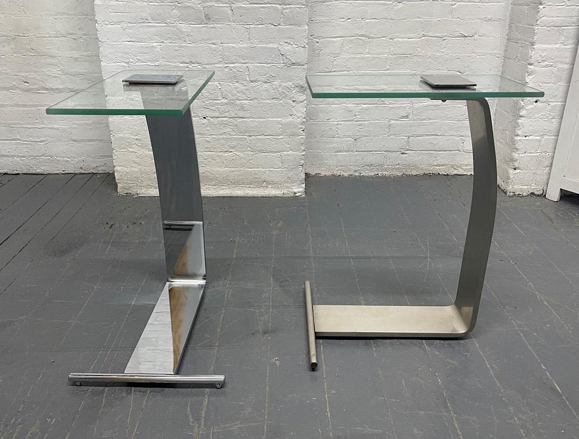 Pair of nickel and glass cantilevered side tables by Design Institute of America.