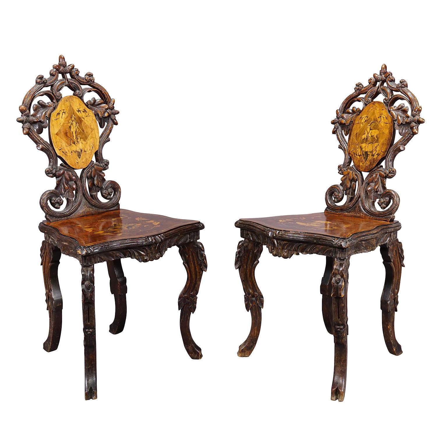 Pair Nutwood Edelweis Marquetry Chairs Swiss Brienz 1900

A pair wonderful inlayed nutwood chairs decorated with inlayed and painted sceneries depicting chamois, goat, hare, hunter, stag and edelweis flowers. Surrounded by ebony and lindenwood
