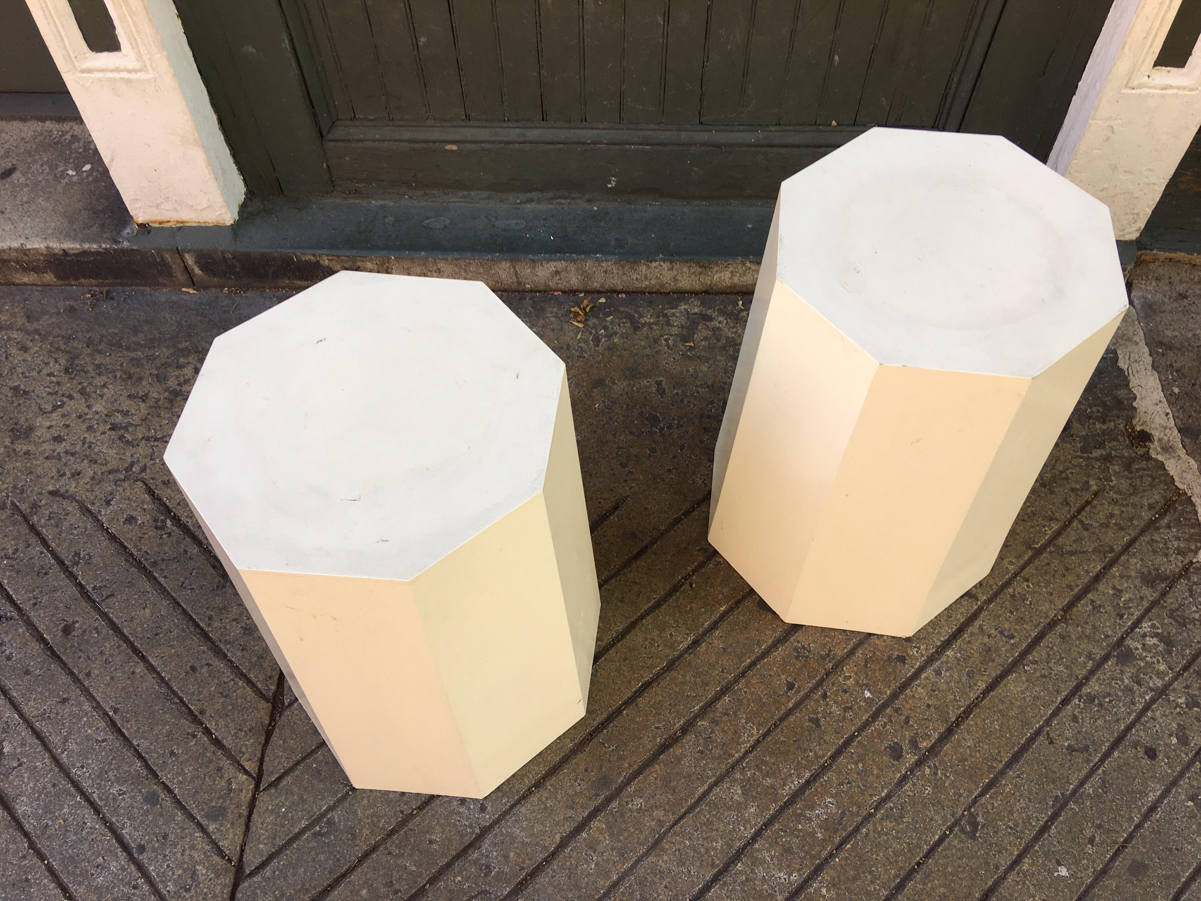 Pair of octagonal display stands. Stands taper down to a larger base. Great for art display or plants! Painted wood can easily be made any color!