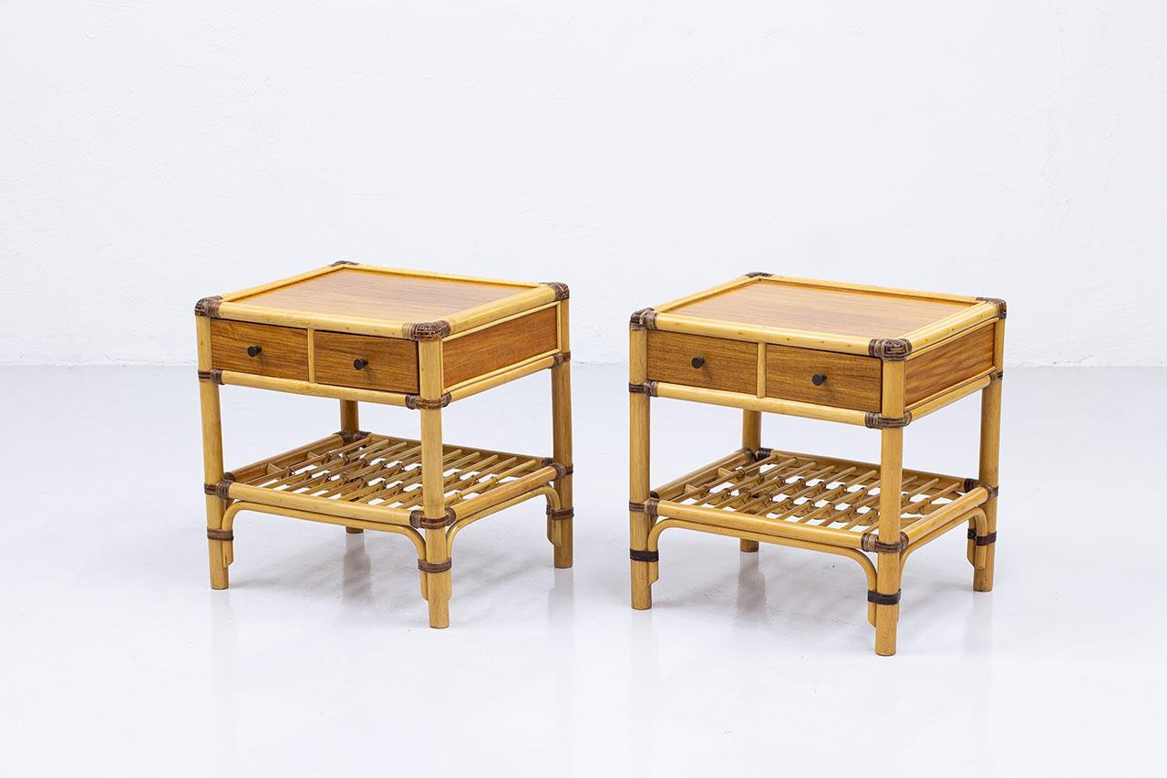 Pair of bedside tables , side tables manufactured by DUX in Sweden during  the 1960s. The tables are made from teak veneer with work of cane, rattan and brass pull out handles. The tables are very sturdy in the making and very decorative with the