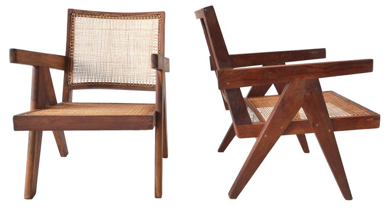 A great pair of easy chairs by Pierre Jeanneret for the Chandigarh project. In a very rare and desirable Sissoo rosewood. This pair is lightly and sympathetically renovated. A simple cleaning and waxing was performed to bring out the color and grain