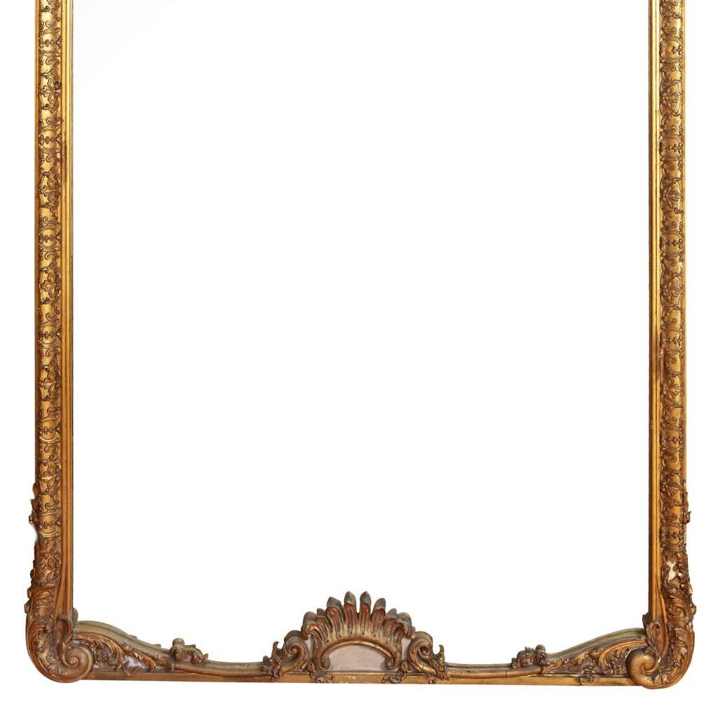 A very rare pair of Palatial 19th century Louis XV style split glass gilt antique pier mirrors, The mirrors are very large and tall, just under 10ft or 3 meters in height.  Each pier mirror with its original 19th century split mirror plates and