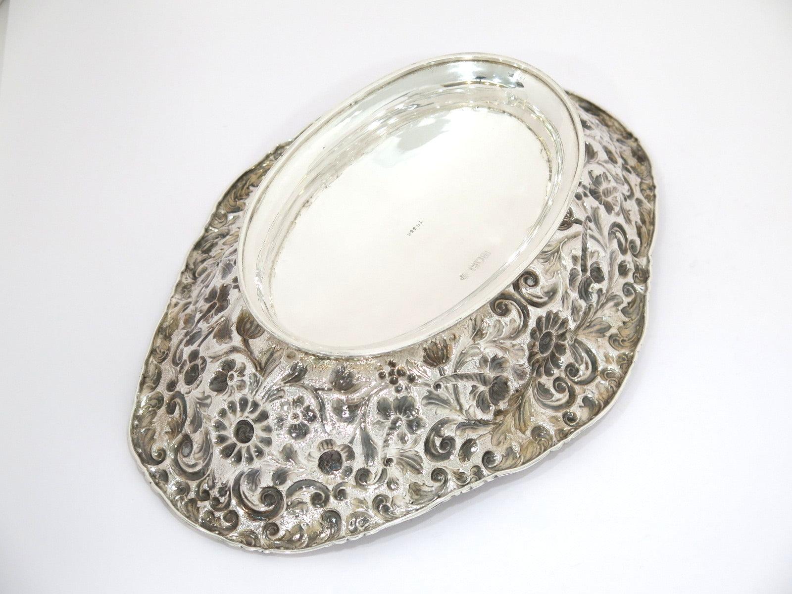 Pair of Sterling Silver Antique English Floral Repousse Footed Serving Bowls In Good Condition For Sale In Brooklyn, NY