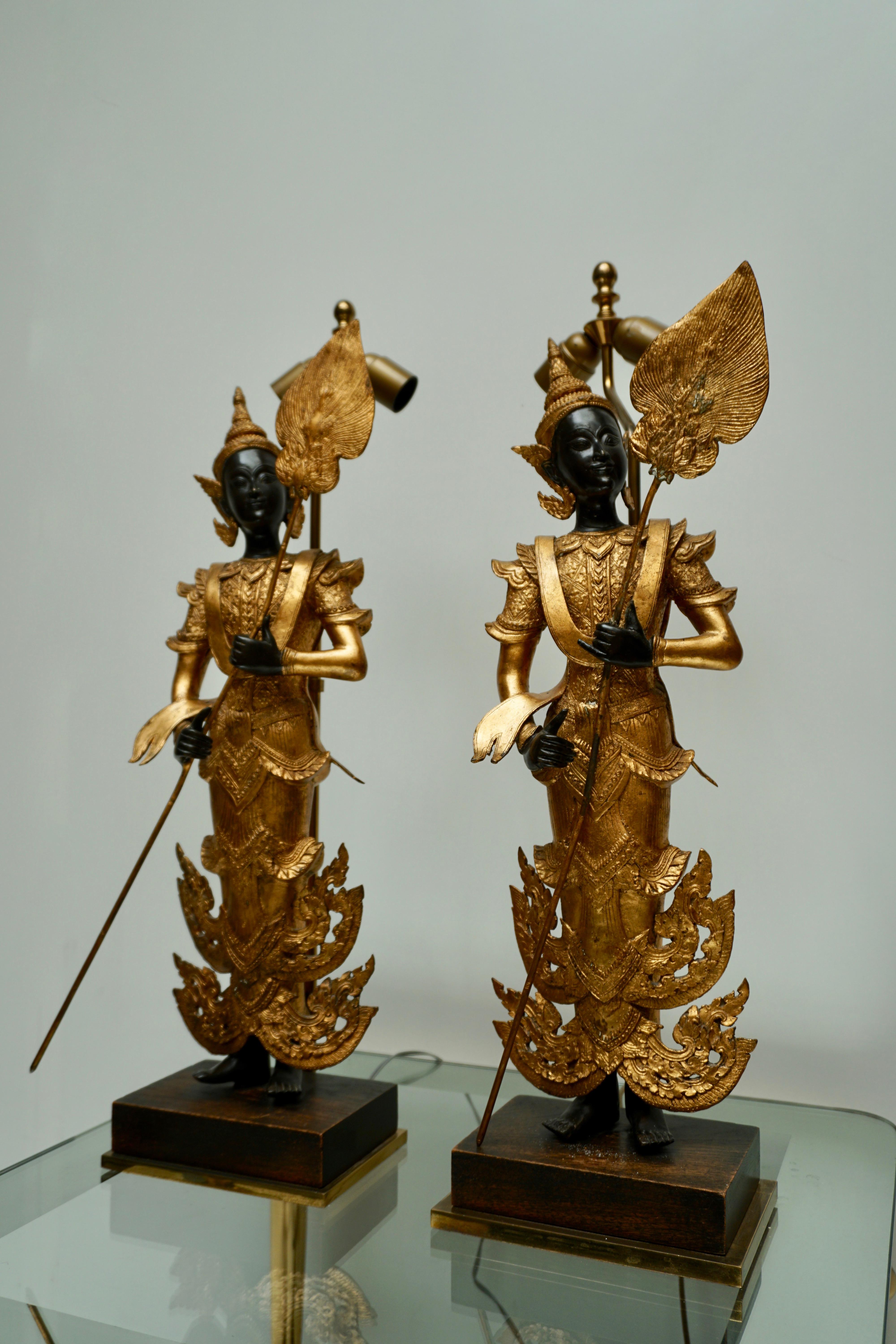 Hollywood Regency Pair of 120th Century Thai Gilt Bronze Figural Lamps For Sale