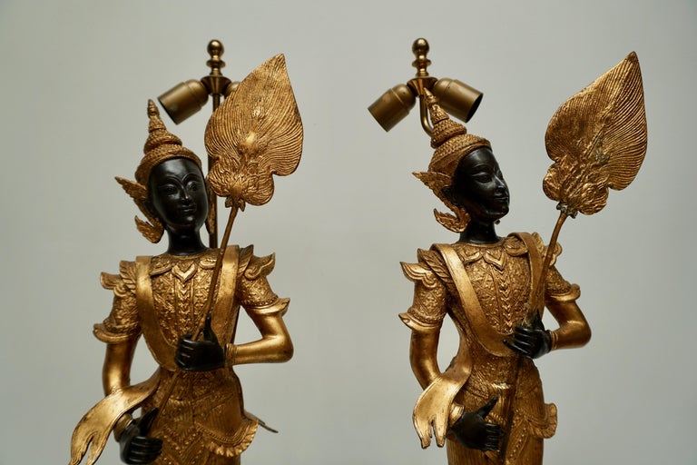 Wood Pair of 120th Century Thai Gilt Bronze Figural Lamps For Sale