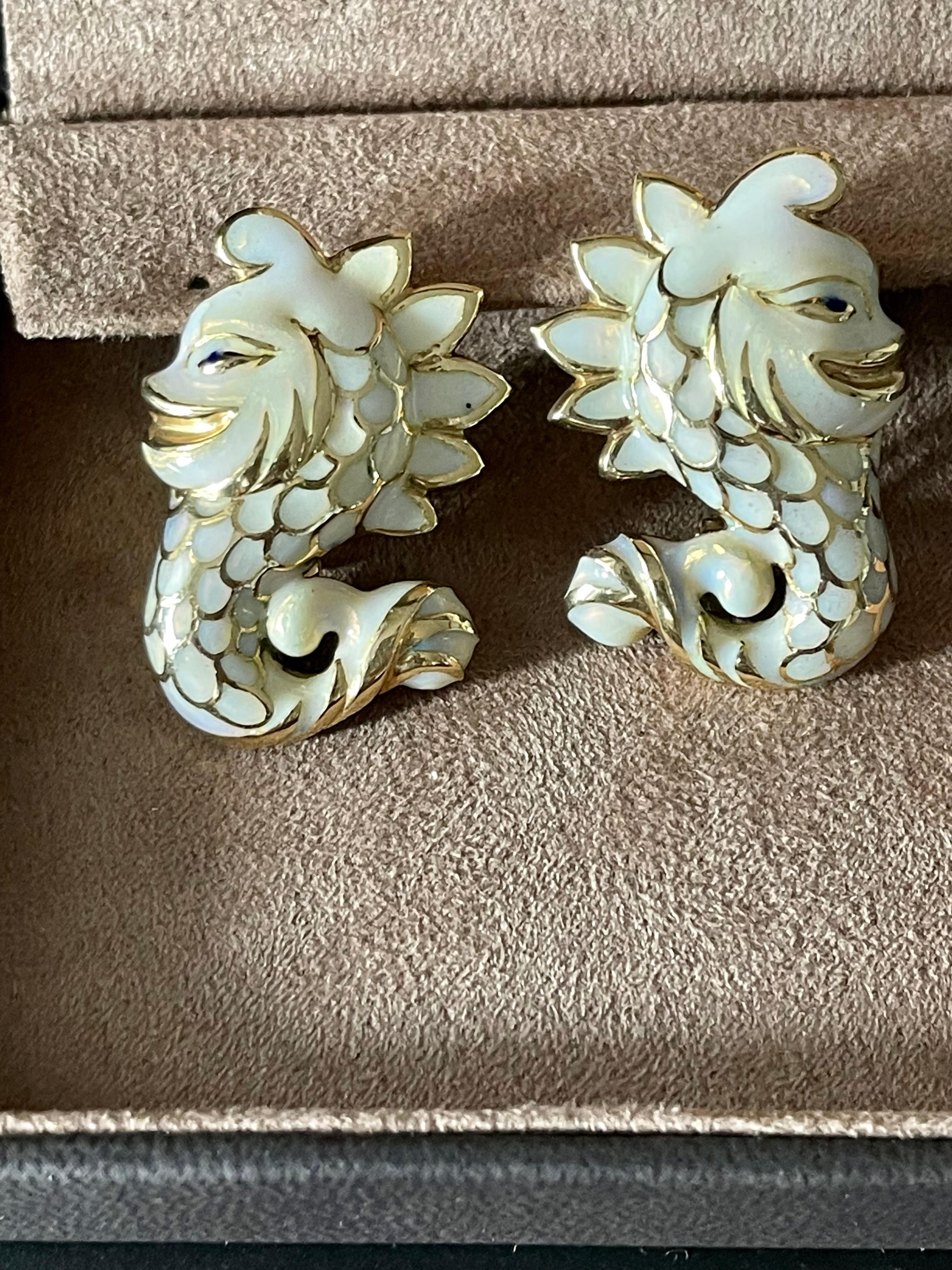 Finely detailed pair of playful seahorse earrings, crafted in 14 K yellow Gold covered with nice ivory colored Enamel.
Masterfully handcrafted piece! Authenticity and money back is guaranteed.
Dimensions: 3.7 cm x 2.6 cm. Solid 14 K yellow Gold.