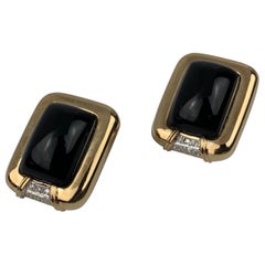 Pair of 14 Karat Cabochon Black Onyx and Diamond Earrings