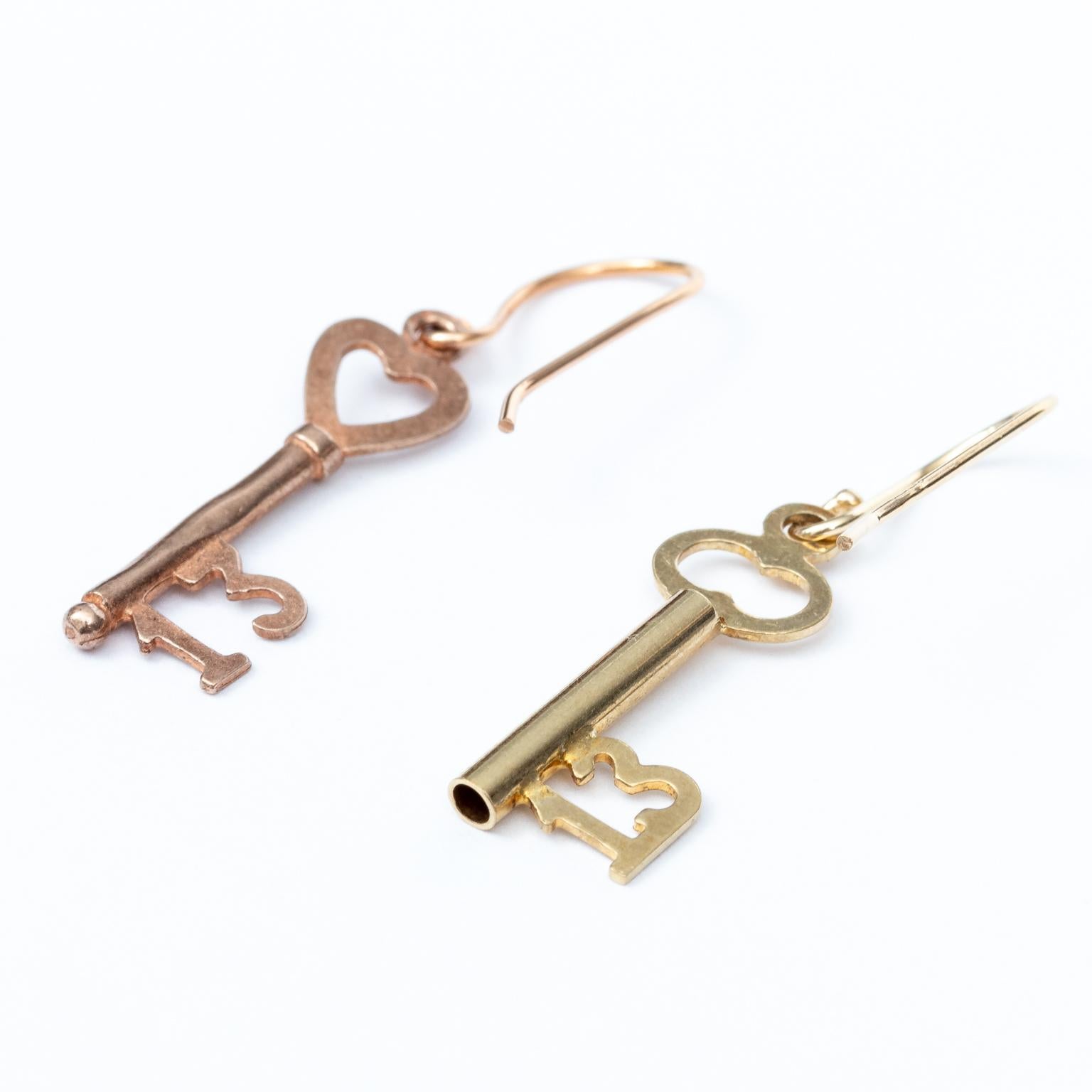 Contemporary Pair of 14 Karat Yellow and Pink Gold Key Earrings For Sale