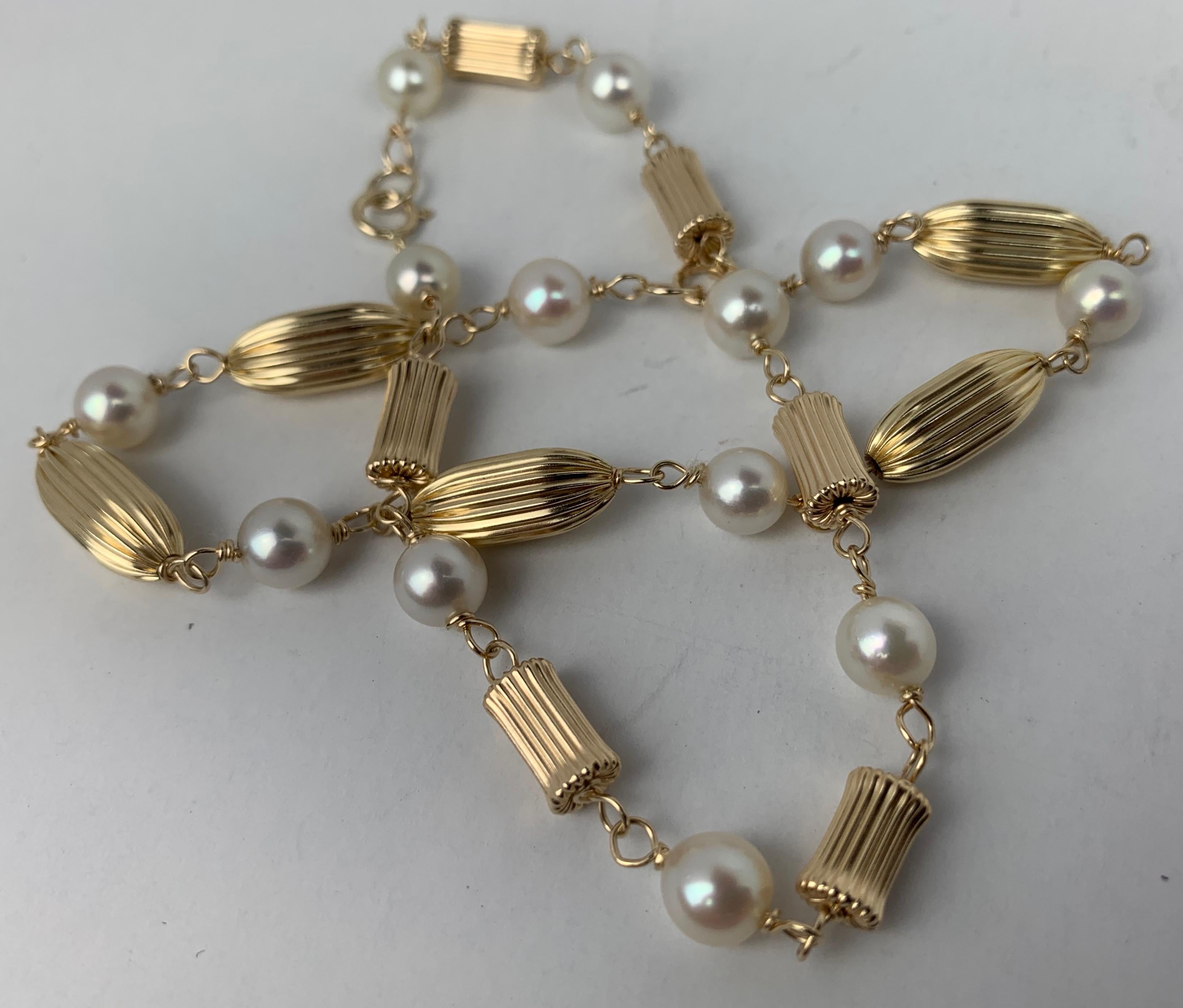 Round Cut  Pair of Pearl and Fluted 14K Yellow Gold Bead Bracelets 