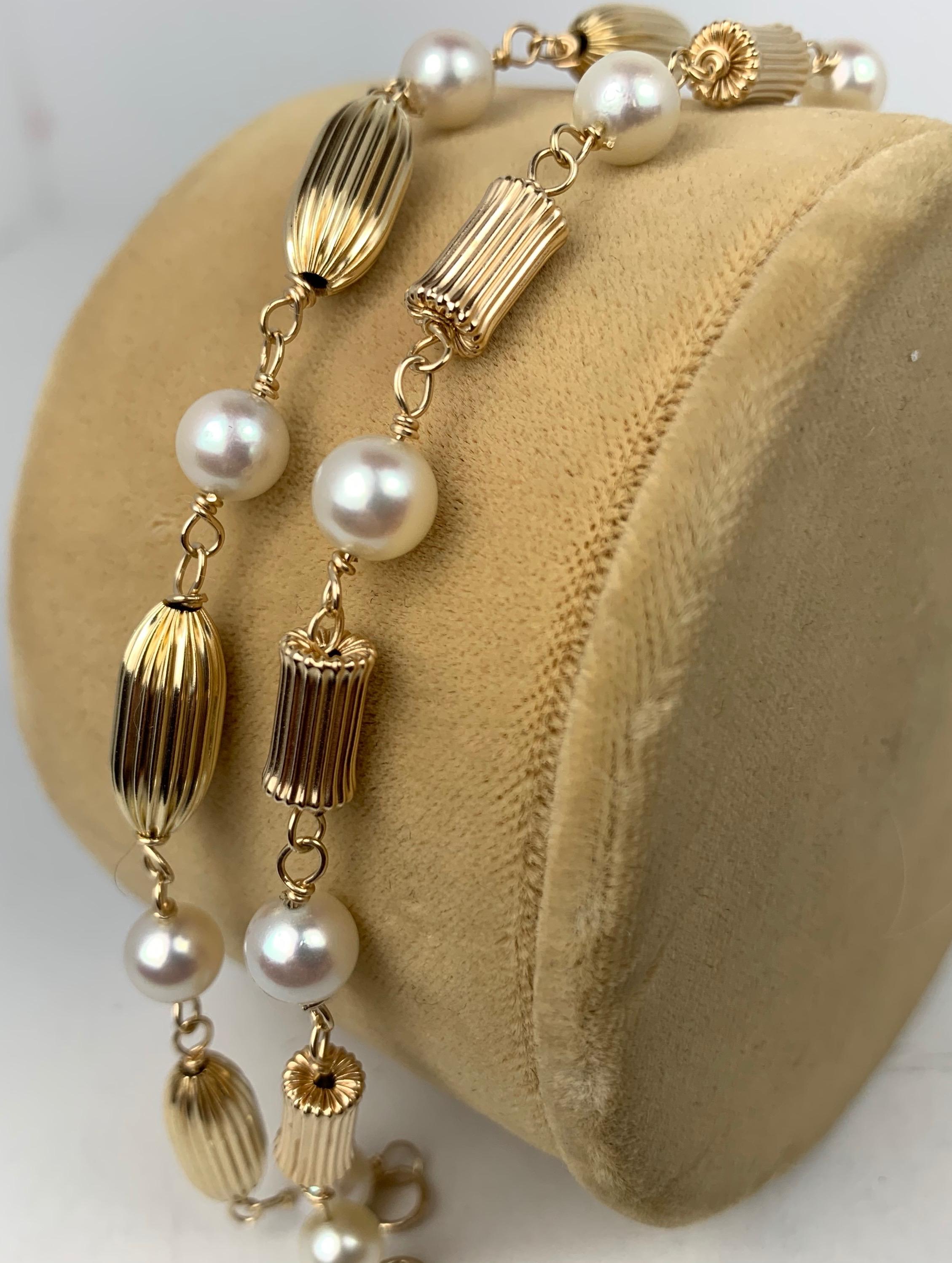  Pair of Pearl and Fluted 14K Yellow Gold Bead Bracelets  In Good Condition In West Palm Beach, FL