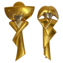 Pareja de broches de oro amarillo de 14 quilates y diamantes firmados "Birks"