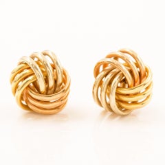 Coppia di orecchini con nodo d'amore in oro giallo 14K